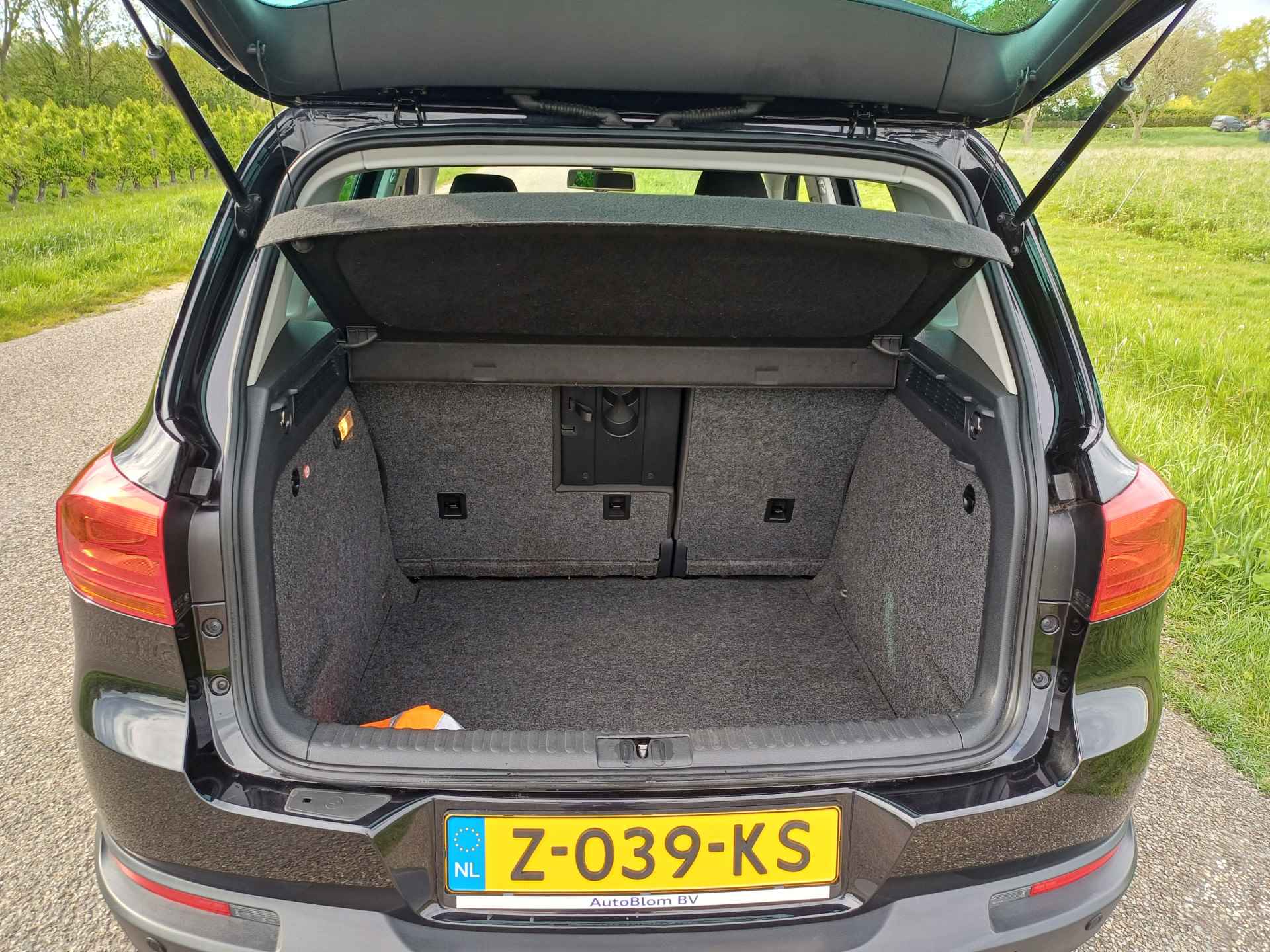 Volkswagen Tiguan 1.4 TSI Sport&Style Clima. | Navi. | Cruise | Trekh. | Stoelverw. | 100% onderh. | Mooie auto! - 29/46