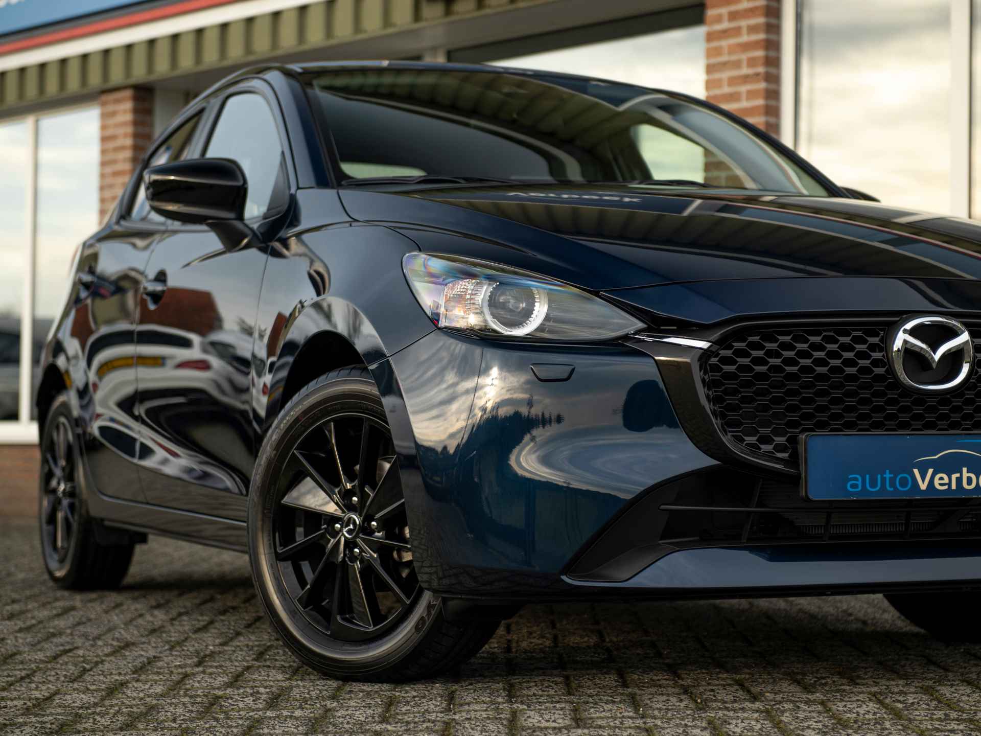 Mazda 2 1.5 SA-G 90pk Aut. Homura | Camera | Apple Carplay/Android Auto | Stoel- en stuurverwarming | Climate Control | Blind Spot | Donker glas achter - 31/45