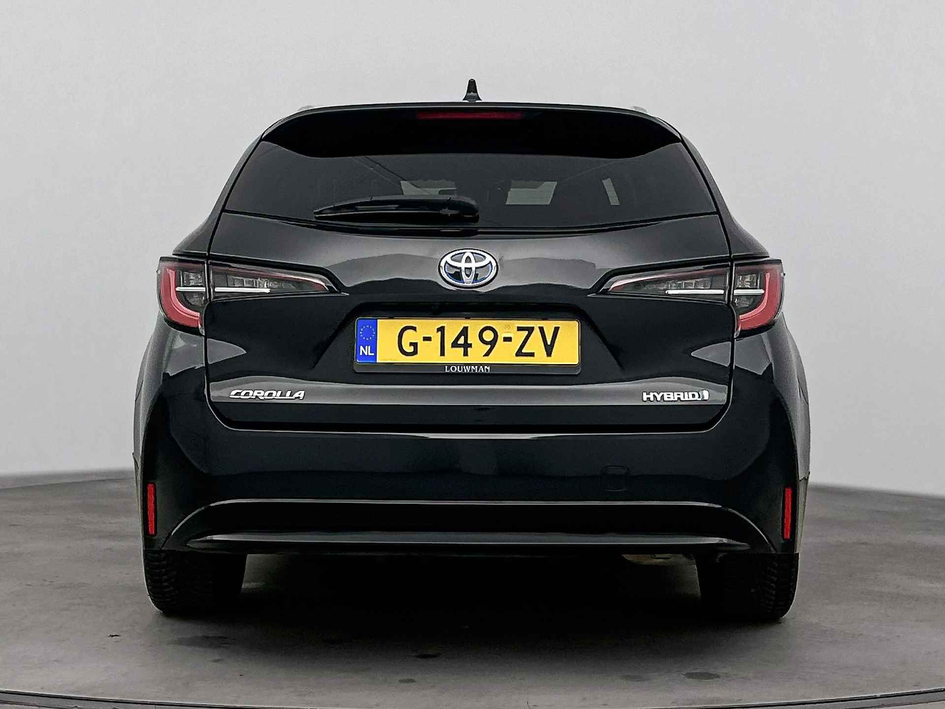 Toyota Corolla Touring Sports 1.8 Hybrid Dynamic | Cruise Control Adaptief | Climate Control | LM velgen | Stoelverwarming | Draadloze telefoonlader | polak | amst. zuid-oost - 29/43