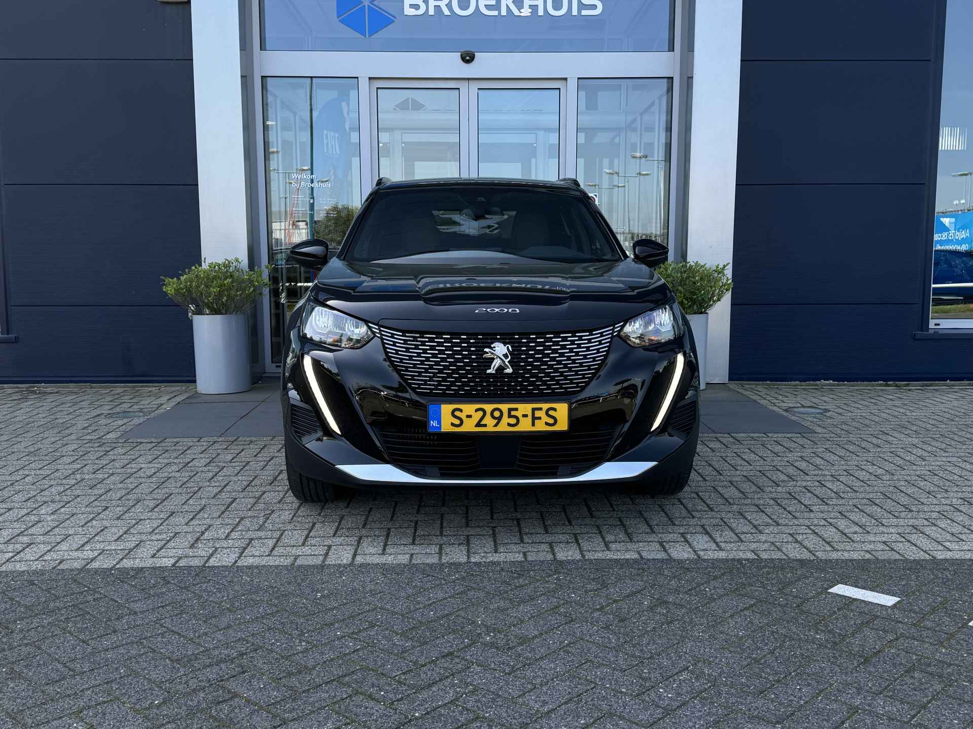 Peugeot 2008 1.2 100PK Allure | PDC achter | Climate Control | Cruise Control | Carplay - 7/29