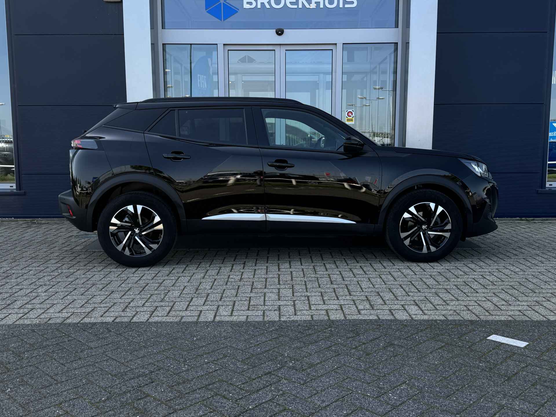 Peugeot 2008 1.2 100PK Allure | PDC achter | Climate Control | Cruise Control | Carplay - 8/29