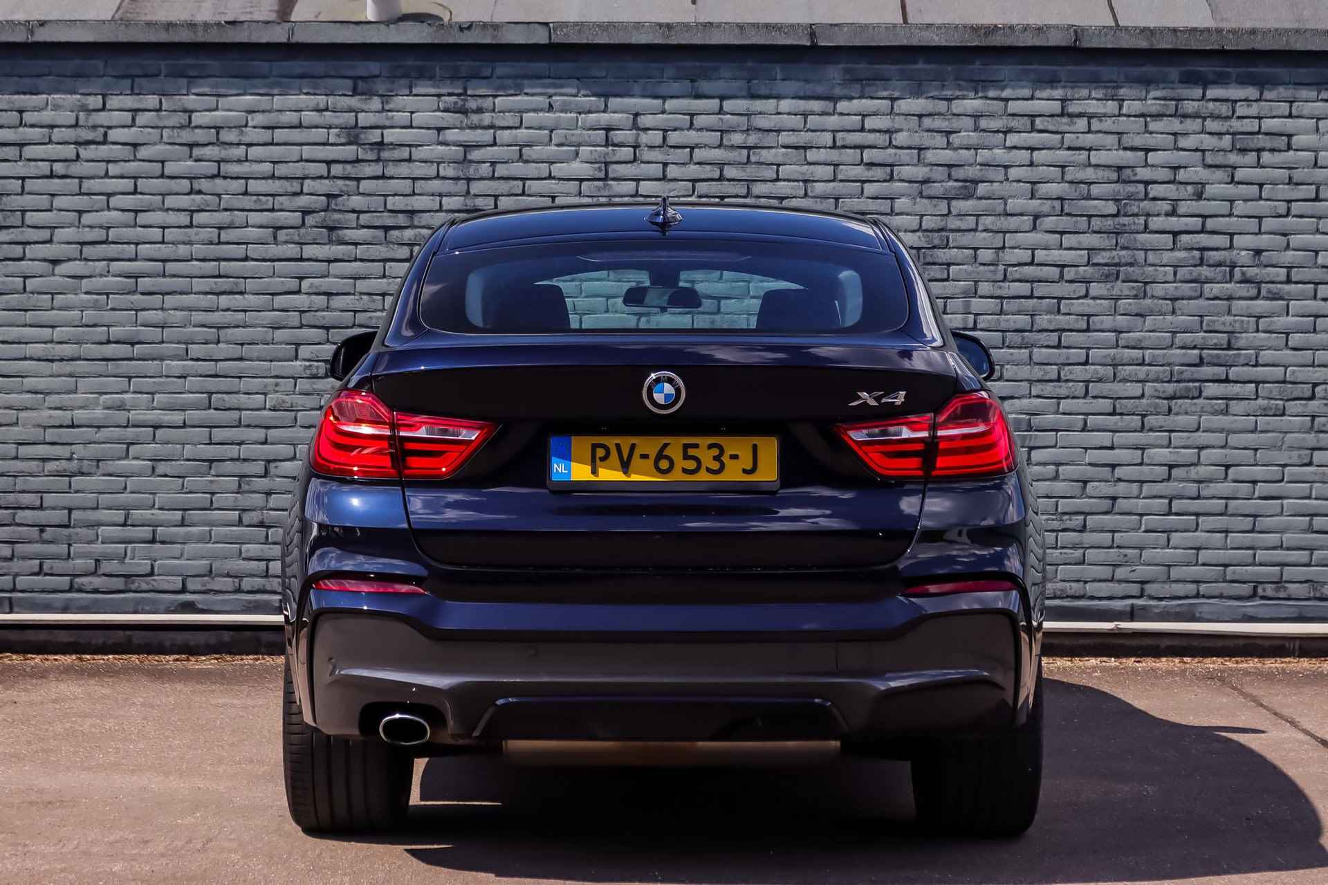 BMW X4 xDrive20i High Executive M-Sport Shadow | Leder | Navi Professional | Xenon LED | Elektrische Achterklep | Park Distance Control | Climate Control | Alarm | Stoelverwarming - 8/35