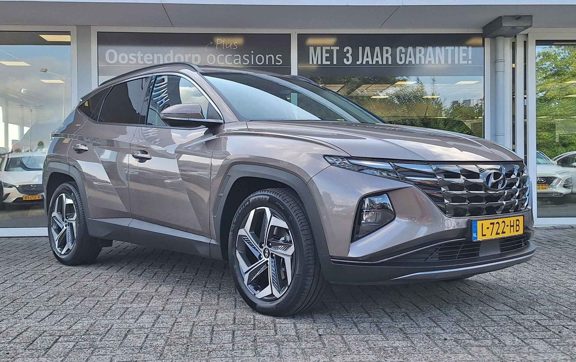 Hyundai Tucson 1.6 T-GDI HEV Premium | Automaat | Navigatie | Cruise Control Adaptief | Climate Control | Parkeersensoren | Parkeercamera | 12Mnd. Garantie | Rijklaar! | - 4/40