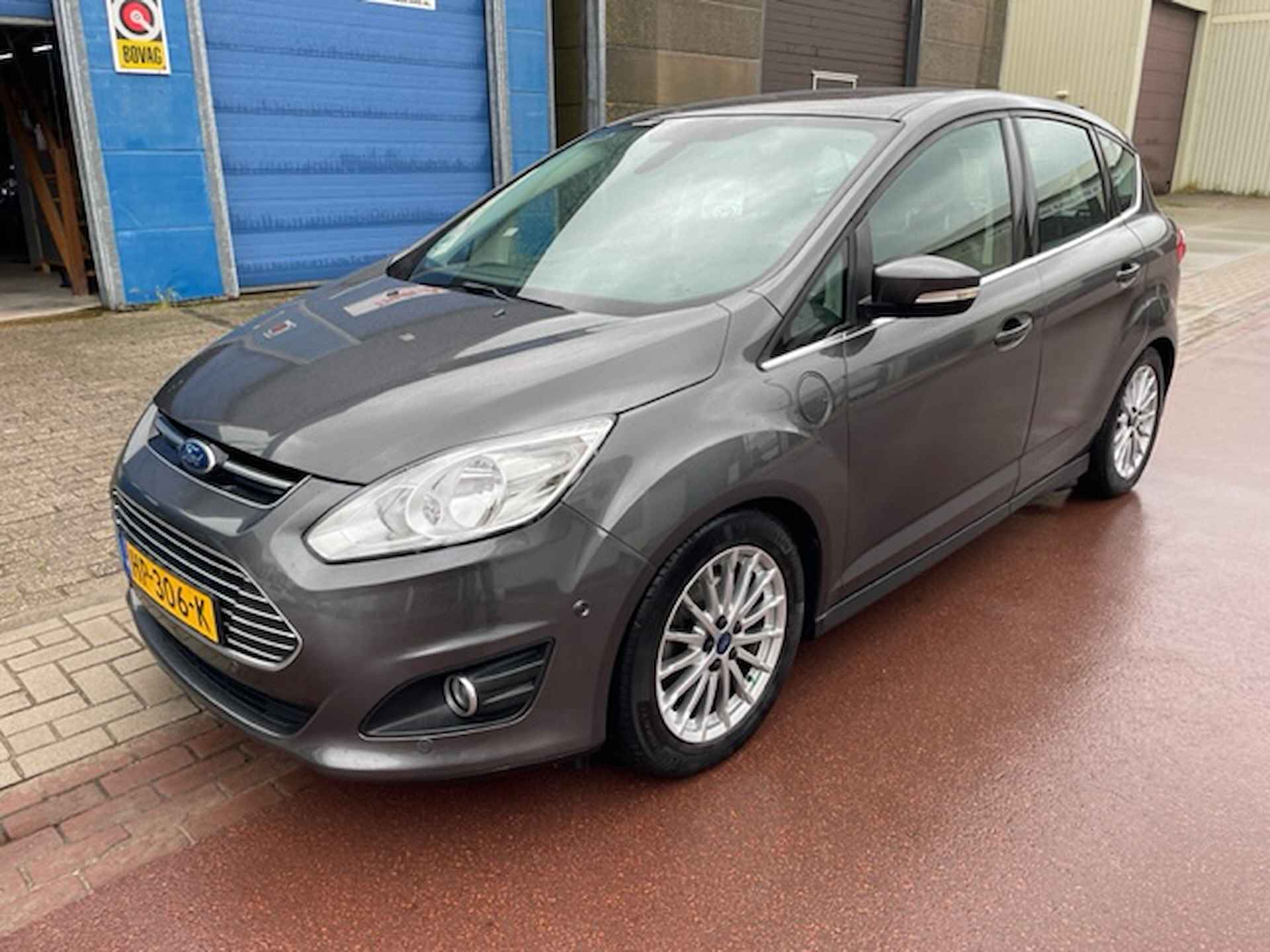 Ford C-MAX 2.0 Plug-in Hybrid Titanium Plus 2015 LEDER Zeer complete uitvoering met Navigatie, park assistance, etc. NAP en alle boekjes zijn aanwezig. - 1/46