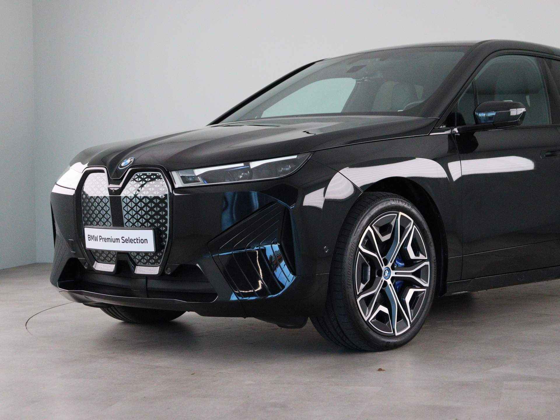 BMW iX xDrive50 Business Edition Plus Sportpakket - 21/26