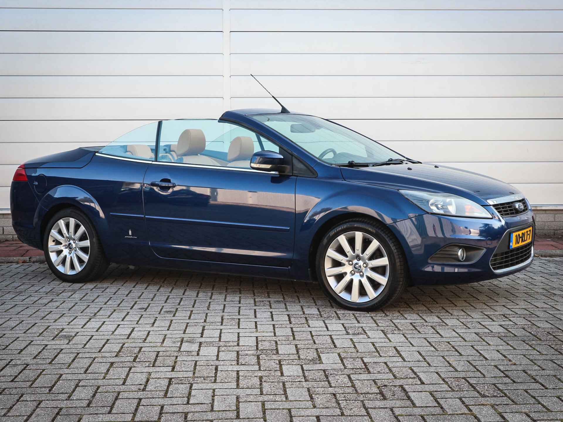 Ford FOCUS Coupe-cabriolet 2.0 Limited | Clima | Cruise | Navi | Leer | 17 Inch | Pdc | Voorruitverwarming | Stoelverwarming - 17/45