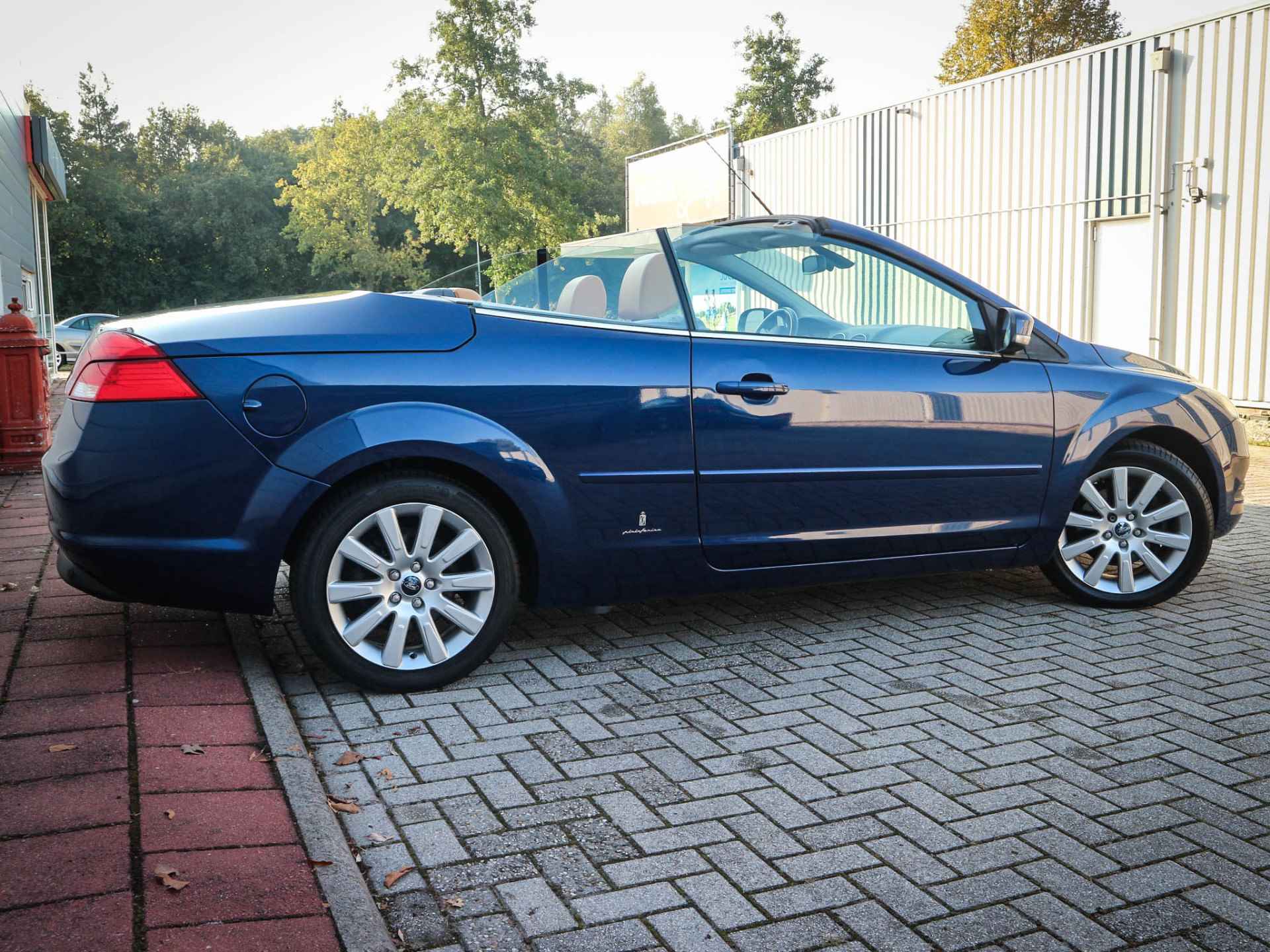 Ford FOCUS Coupe-cabriolet 2.0 Limited | Clima | Cruise | Navi | Leer | 17 Inch | Pdc | Voorruitverwarming | Stoelverwarming - 24/45