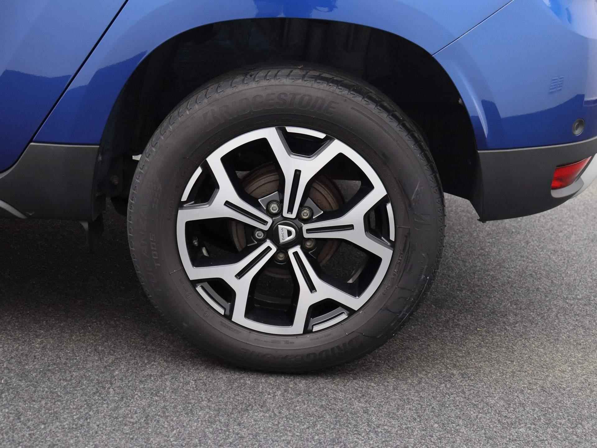 Dacia Duster 1.0 TCe Bi-Fuel Prestige | NAVIGATIE | ACHTERUITRIJCAMERA | CLIMATE CONTROL | CRUISE CONTROL | PARKEERSENSOREN | LICHTMETALEN VELGEN | - 17/31