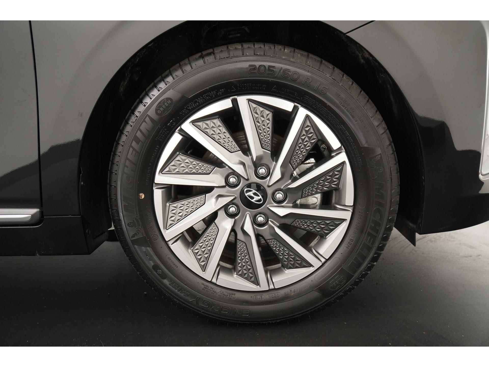Hyundai IONIQ Premium Sky EV 38 kWh | 21945 na subsidie | Schuifdak | Zondag Open! - 33/47