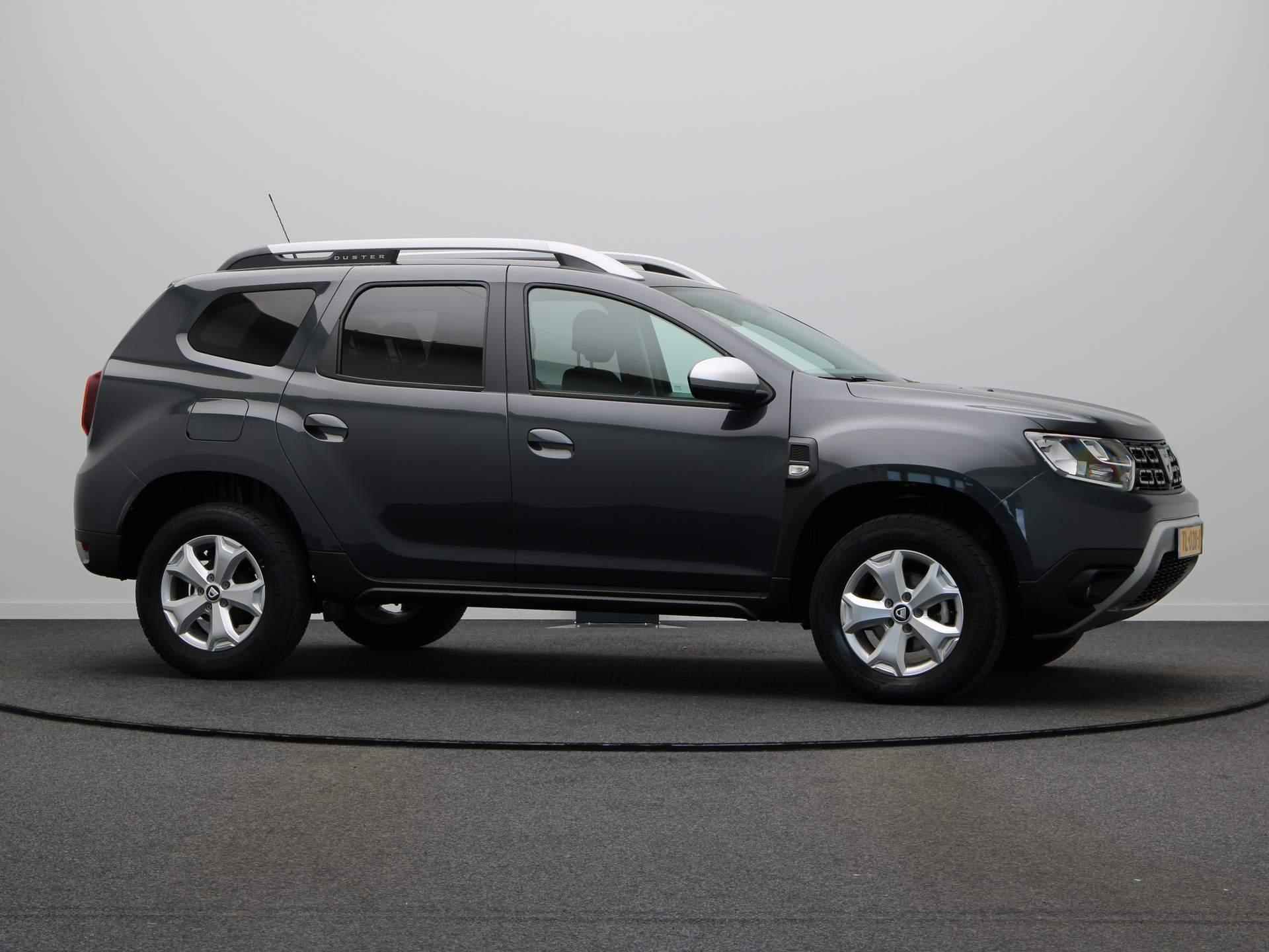 Dacia Duster TCe 125pk Comfort | Trekhaak | Navigatie | Cruise control | Airco | 1500kg Trekgewicht - 13/44