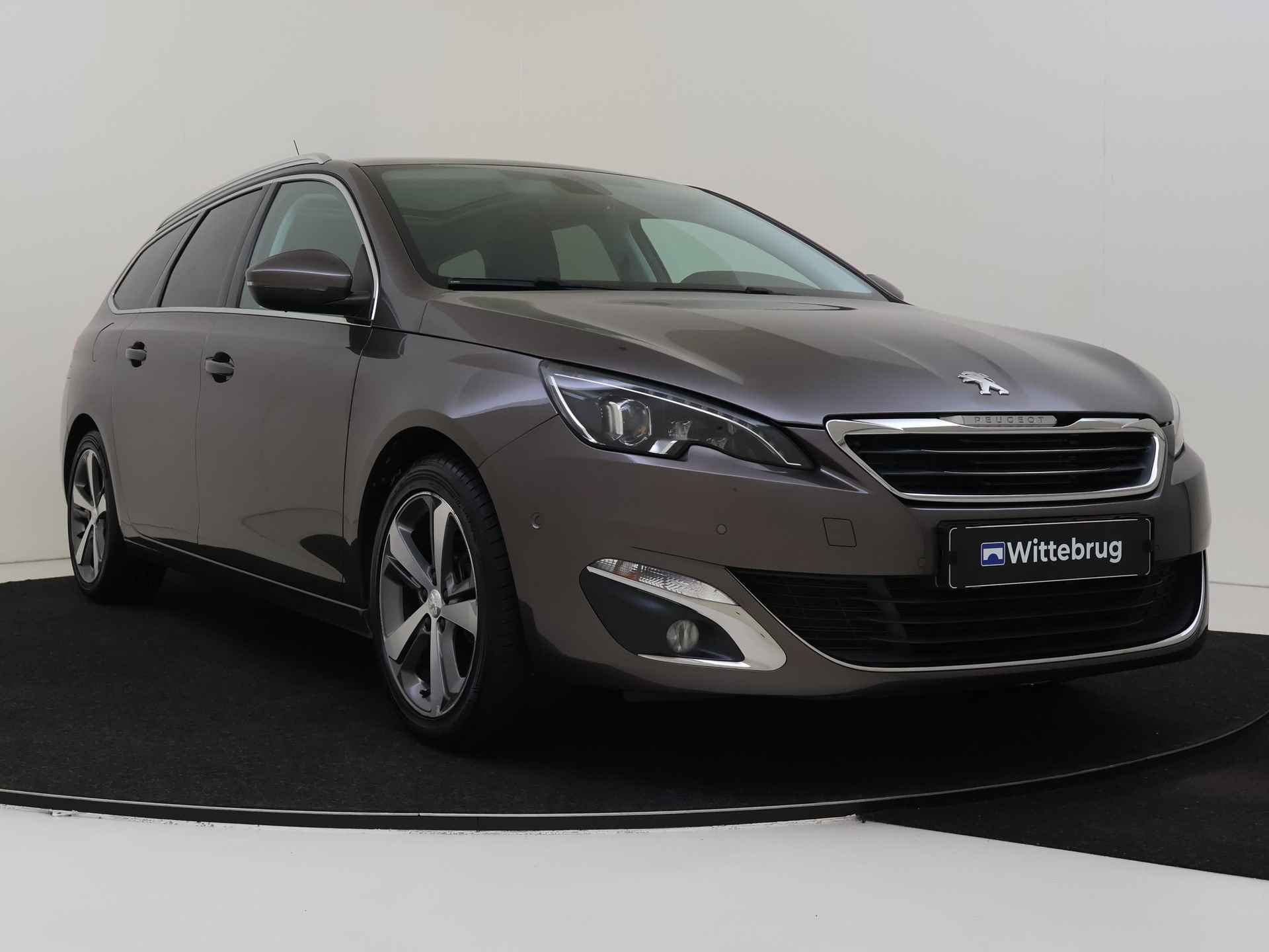 Peugeot 308 SW 1.2 e-THP Première | Trekhaak | Panoramadak | Parkeercamera - 4/42