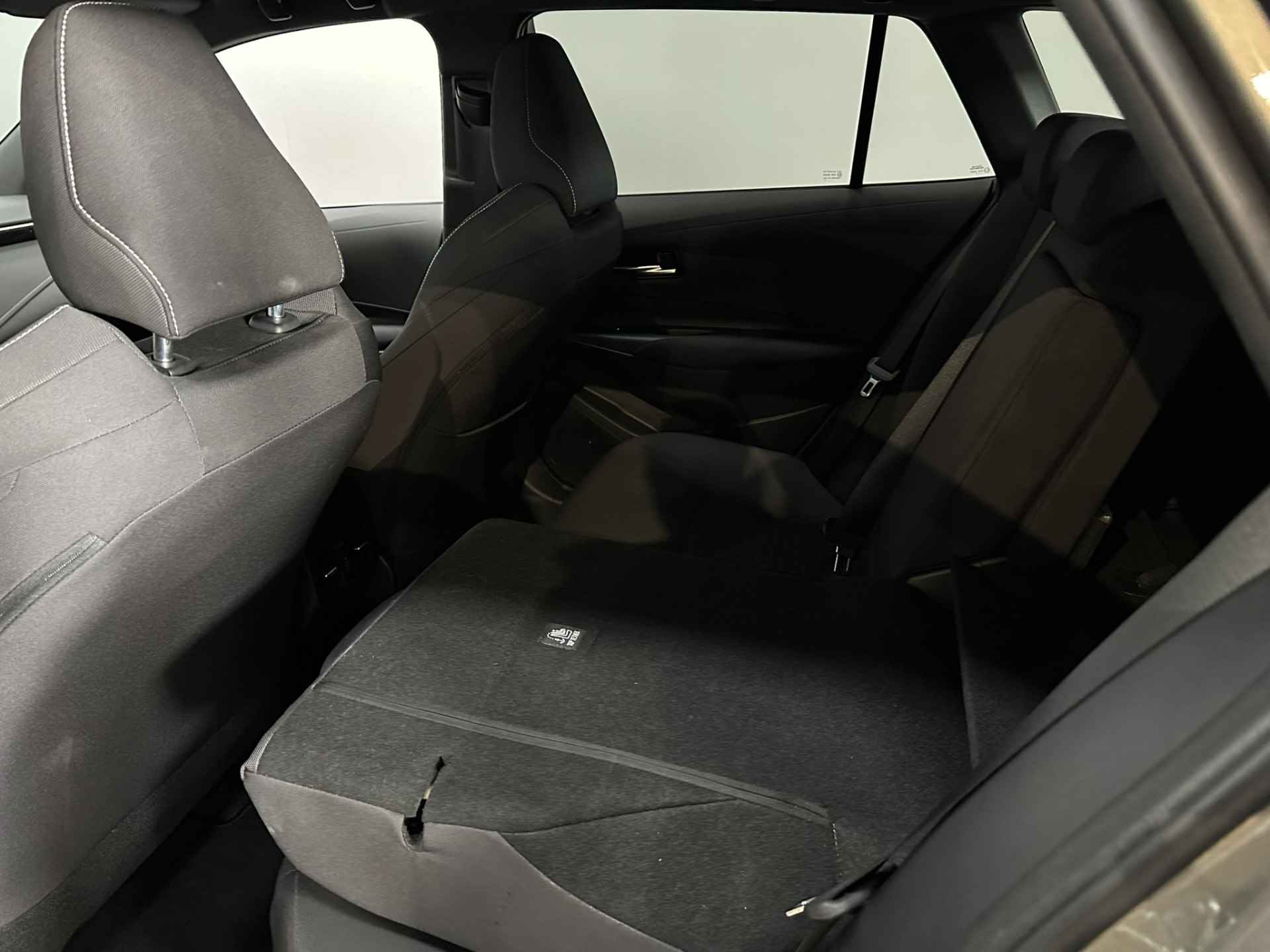 Toyota Corolla Touring Sports 1.8 Hybrid Active LED | Camera | Adaptive cruise | Navigatie | Apple Carplay Android Auto | Isofix | NAP | - 31/38