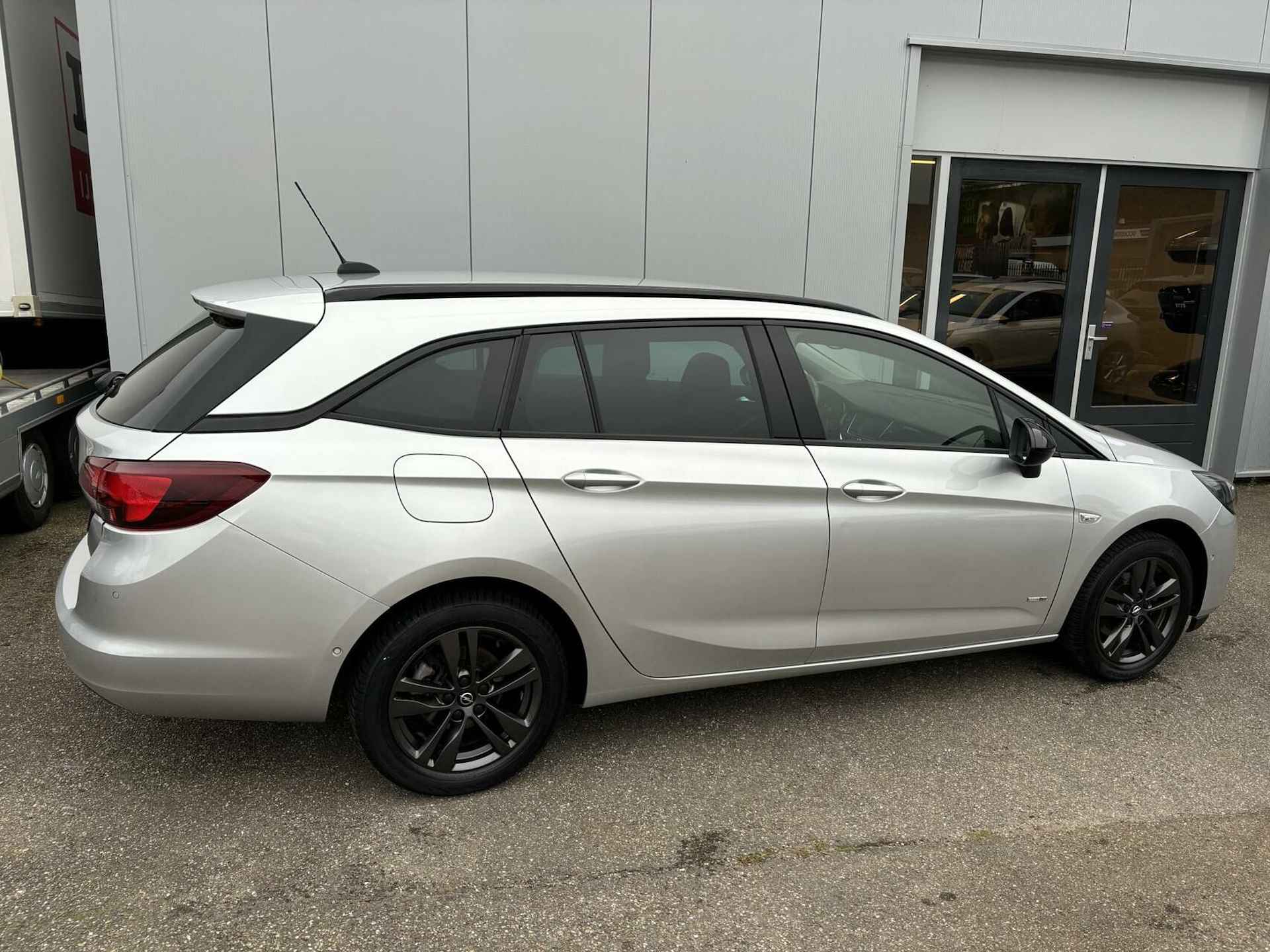 Opel Astra Sports Tourer 1.2 Design & Tech 130PK | Carplay | Camera | LM-Velgen - 35/39