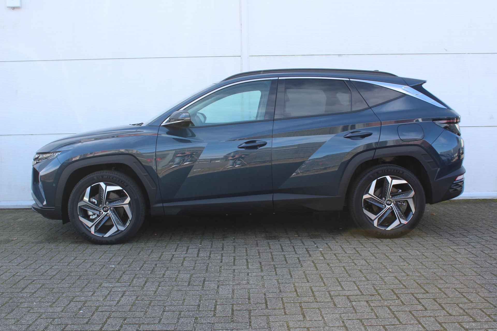 Hyundai Tucson 1.6 T-GDI PHEV Premium 4WD / Navigatie + Apple Carplay/Android Auto / Climate Control / Lederen Bekleding / Adaptieve Cruise Control / Full Option / - 47/57