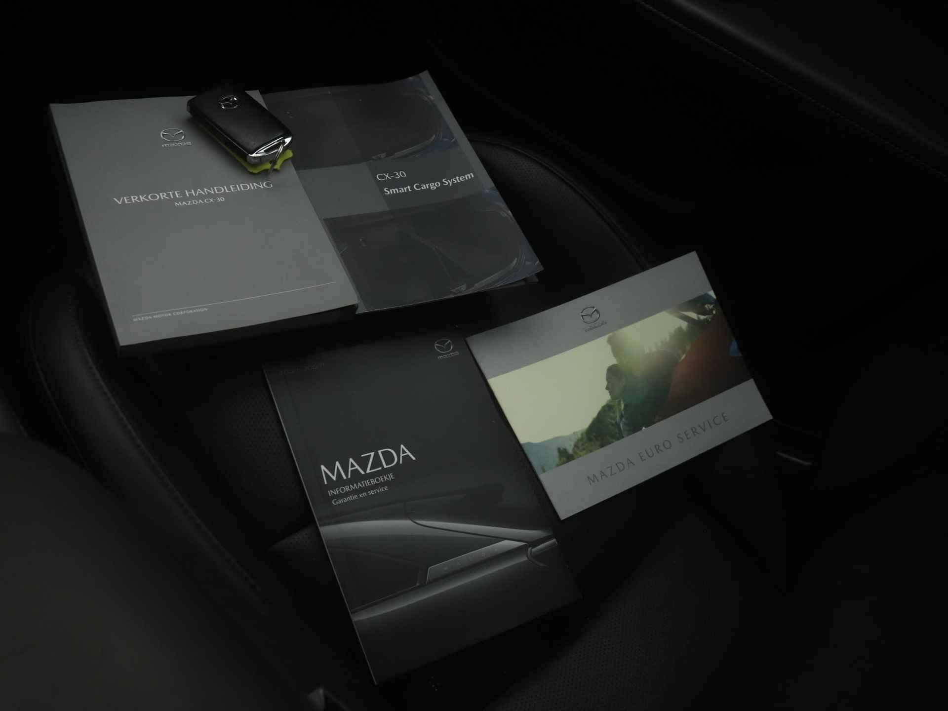 Mazda CX-30 2.0 e-SkyActiv-X Luxury automaat met aero pack en all-weather banden : dealer onderhouden (GERESERVEERD) - 40/48