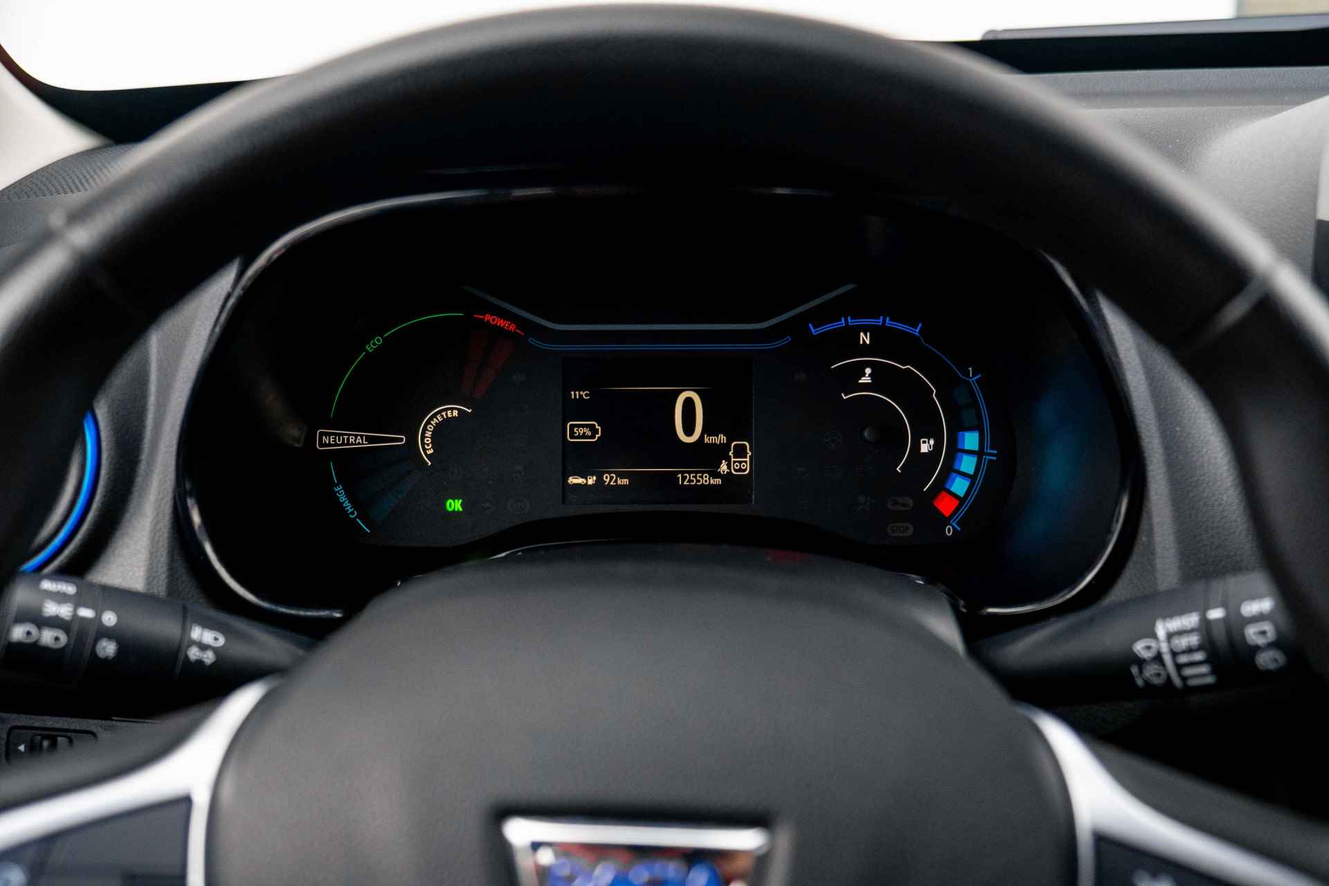 Dacia Spring Comfort Plus 27 kWh | Achteruitrijcamera | Navigatie | Airco | Snellader 30KW | incl. Bovag rijklaarpakket met 12 maanden garantie | - 14/53