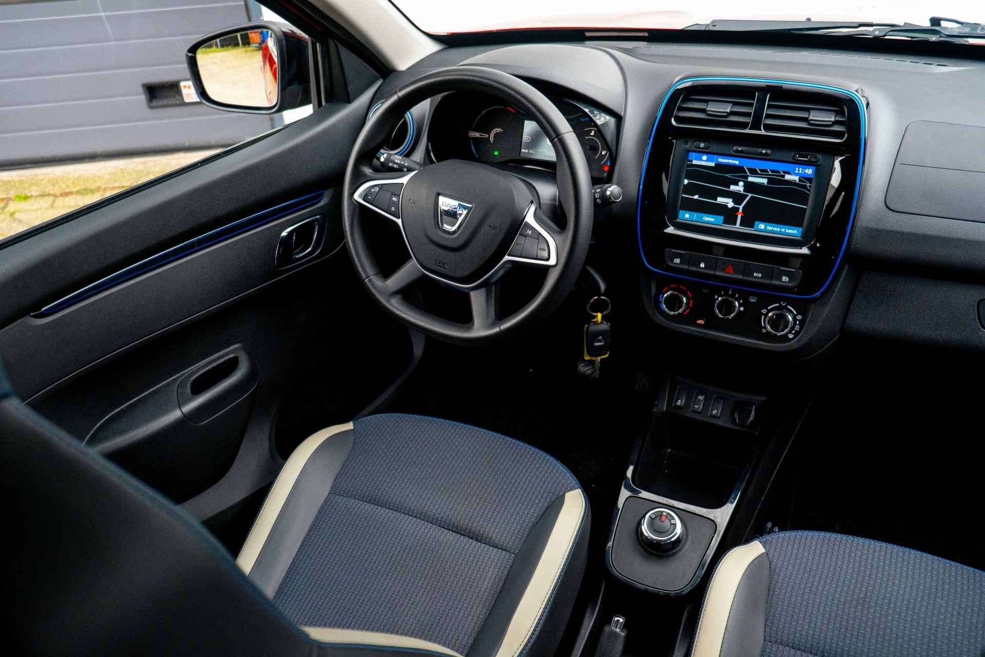 Dacia Spring Comfort Plus 27 kWh | Achteruitrijcamera | Navigatie | Airco | Snellader 30KW | incl. Bovag rijklaarpakket met 12 maanden garantie | - 39/53