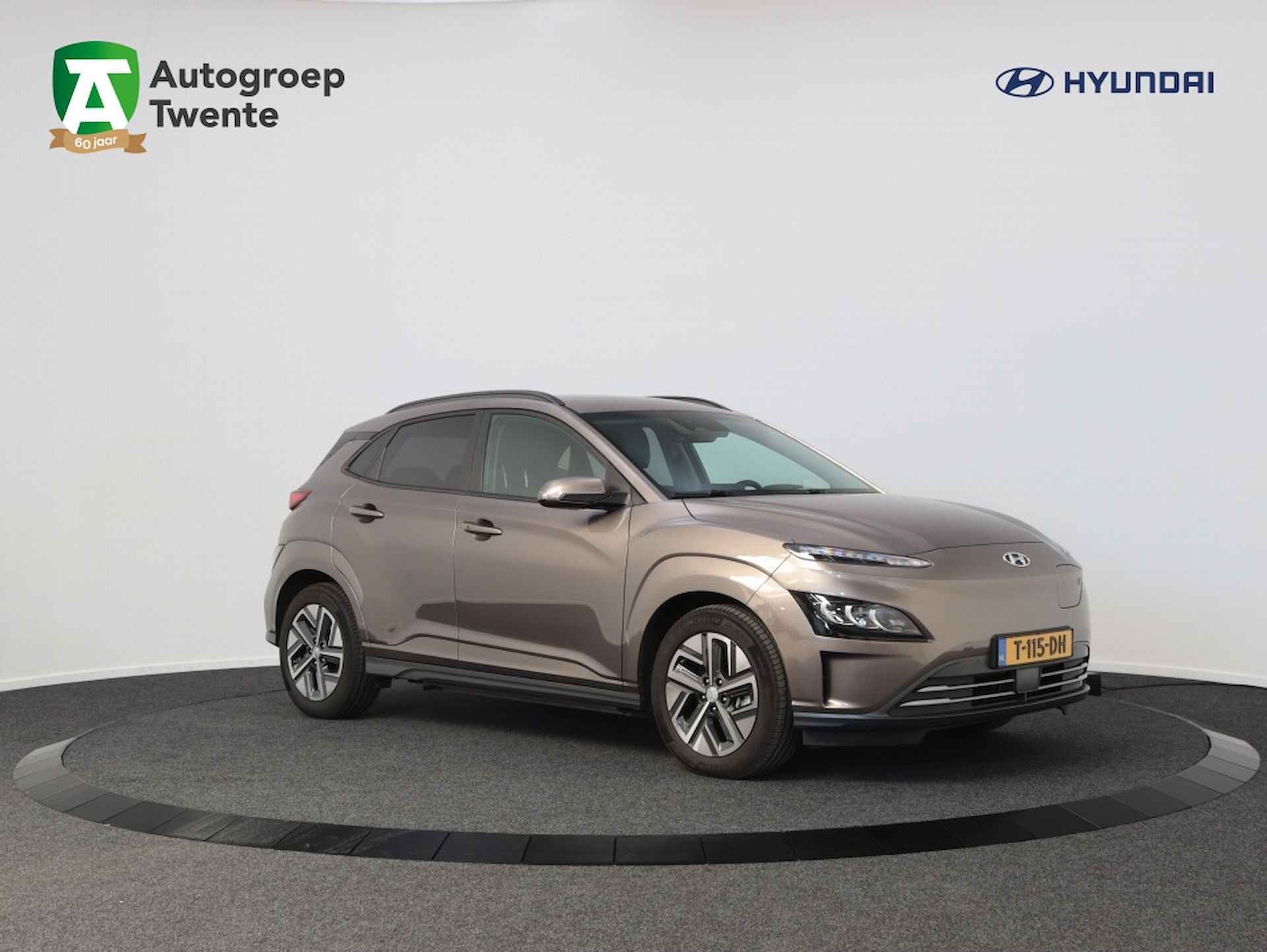 Hyundai Kona EV Premium 64 kWh | Navigatie | Leder | Camera | Carplay | Airco - 1/56