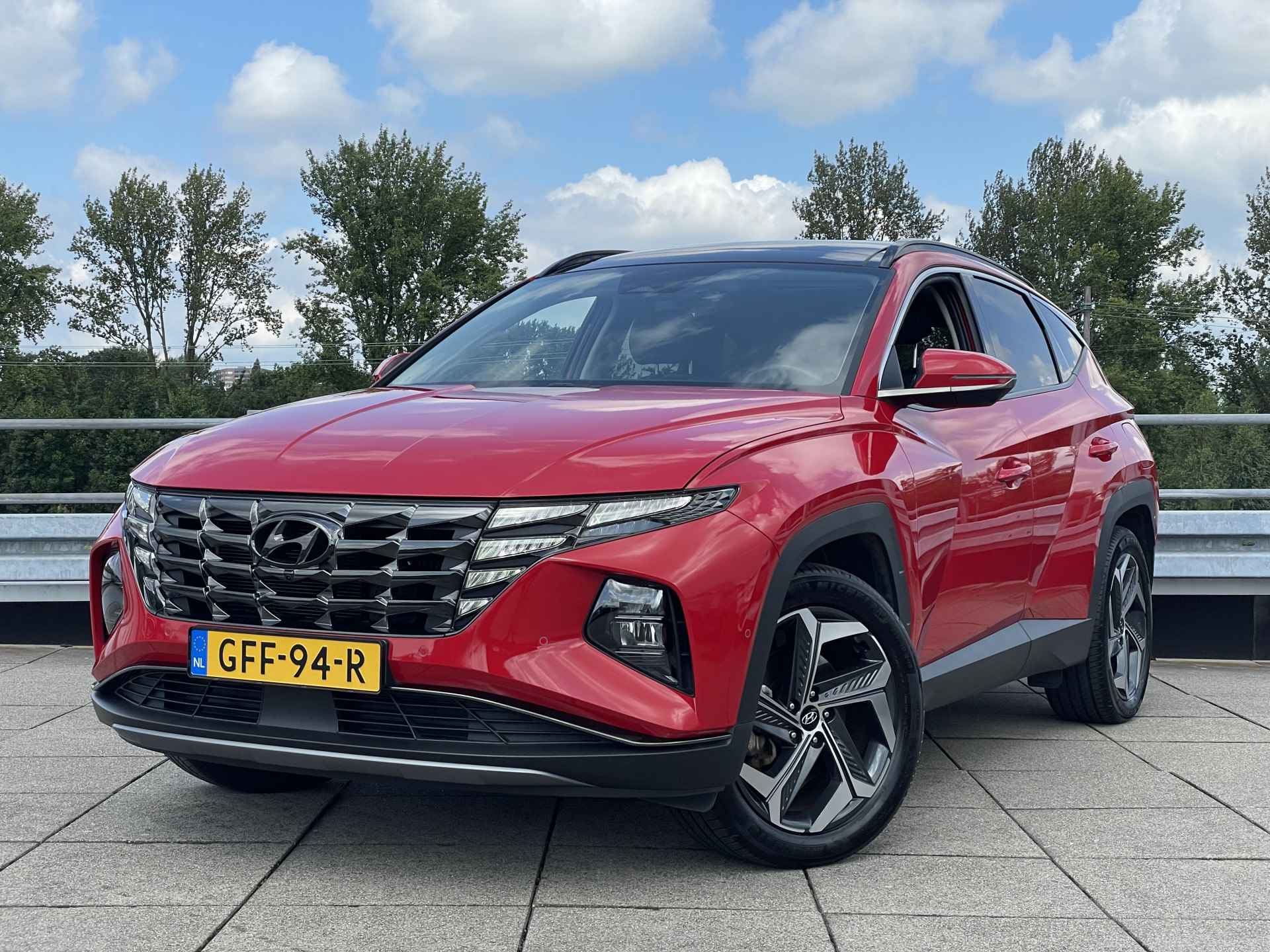 Hyundai Tucson 1.6 T-GDI PHEV Premium Sky 4WD | Schuif-/ kanteldak | Lederen interieur | Rijklaarprijs! | - 4/39