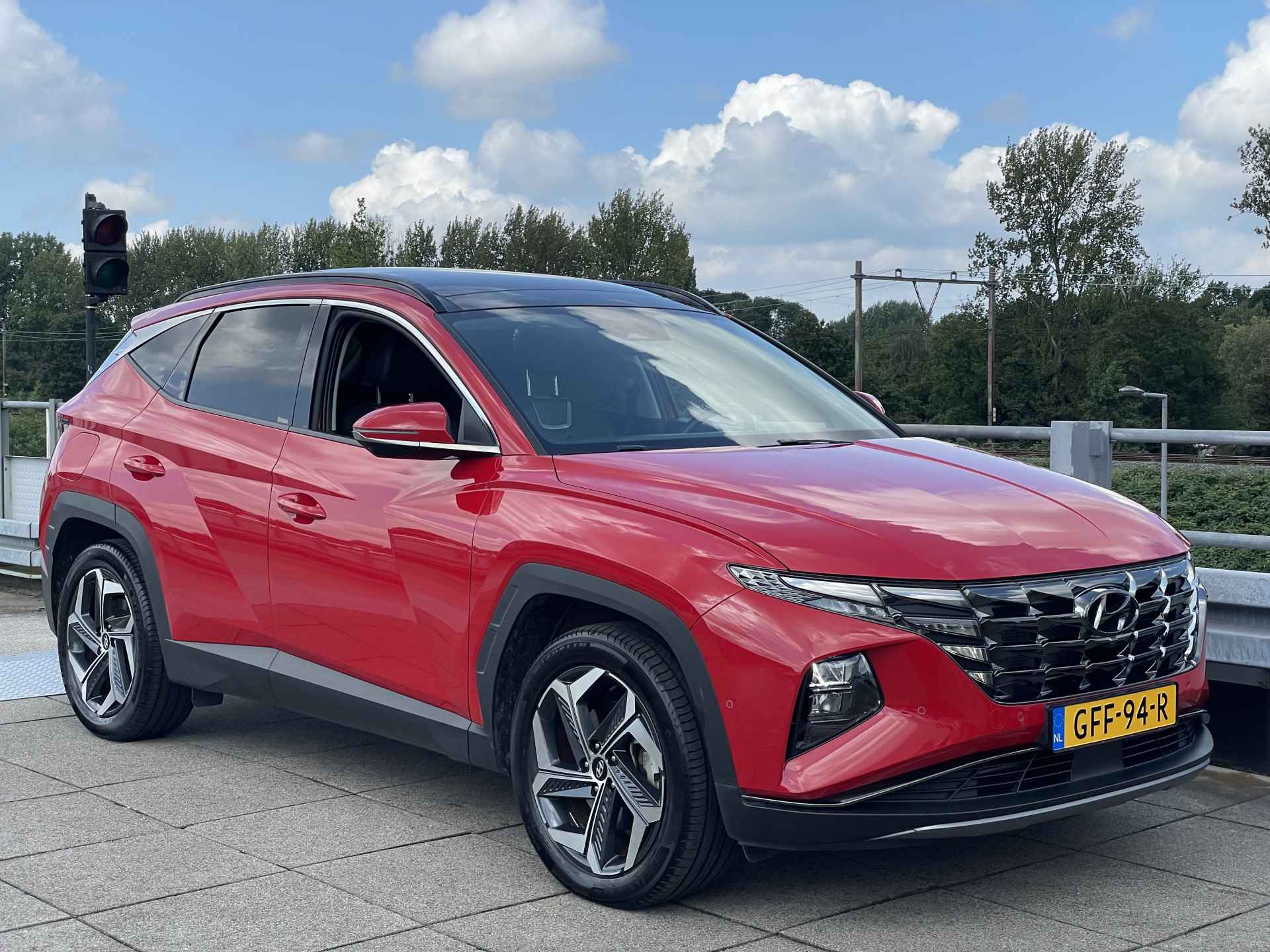 Hyundai Tucson 1.6 T-GDI PHEV Premium Sky 4WD | Schuif-/ kanteldak | Lederen interieur | Rijklaarprijs! | - 38/39