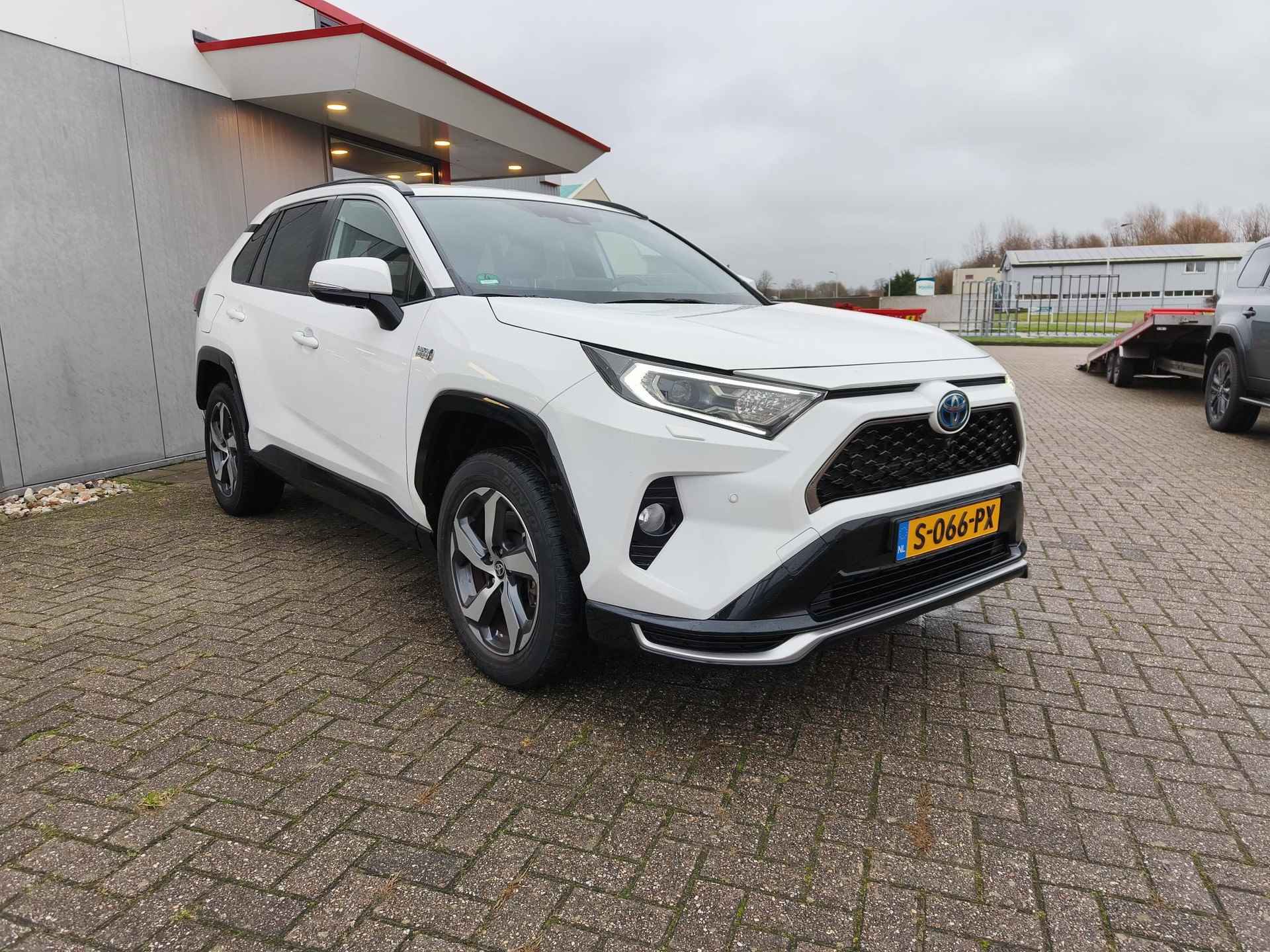 Toyota RAV4 2.5 Plug-in Hybrid AWD Style Limited | Trekhaak | HUD | JBL | Stoel & stuurverwarming | 360 Camera - 7/28