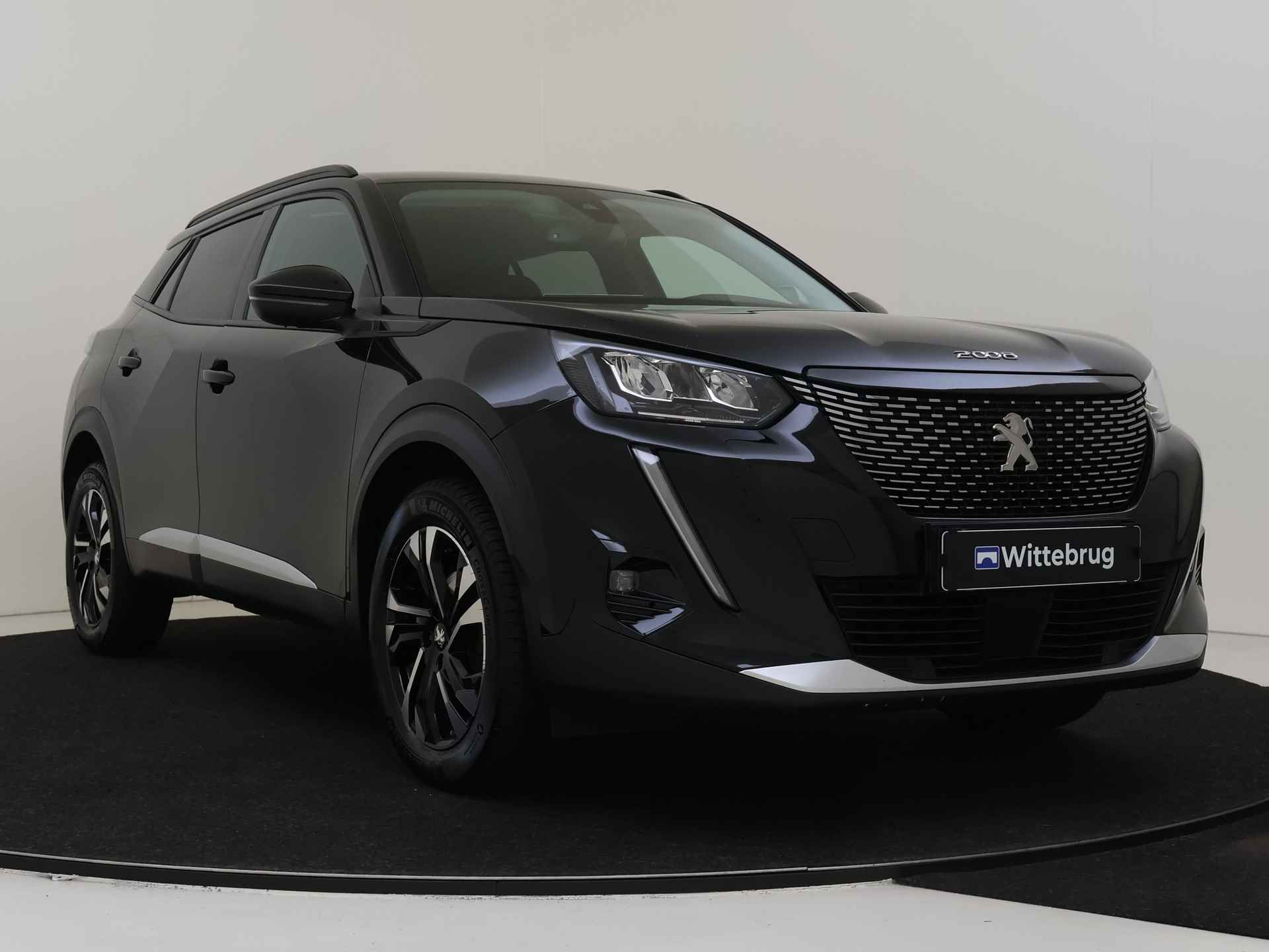 Peugeot 2008 1.2 130PK EAT8 Allure Pack | AUTOMAAT | Navigatie | Camera | Sensoren | - 4/37