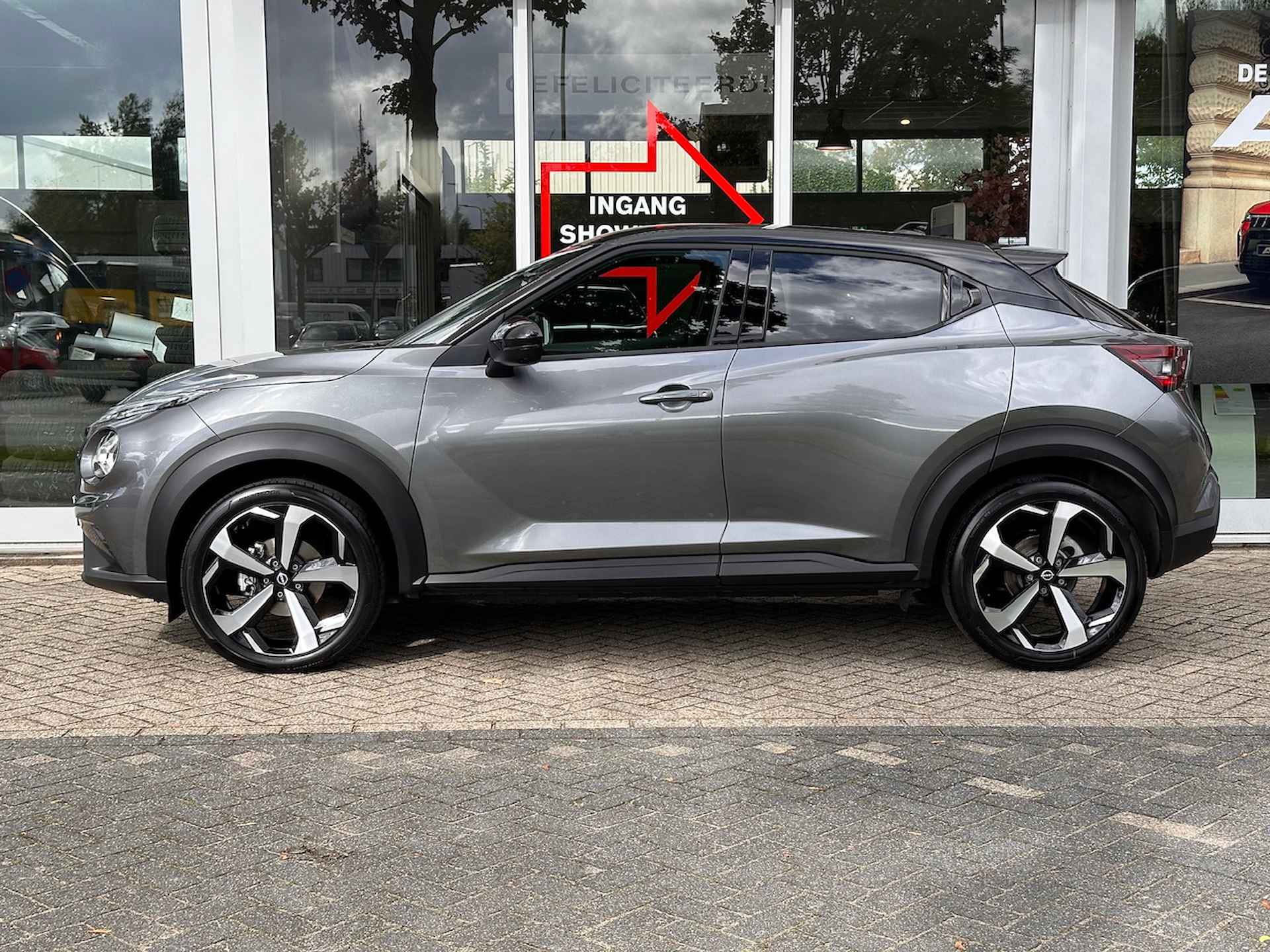 Nissan Juke 1.0 DIG-T 114PK DCT Tekna | Leder | Adaptive cruise | 360 Camera | Navigatie | App Connect | BOSE - 3/32