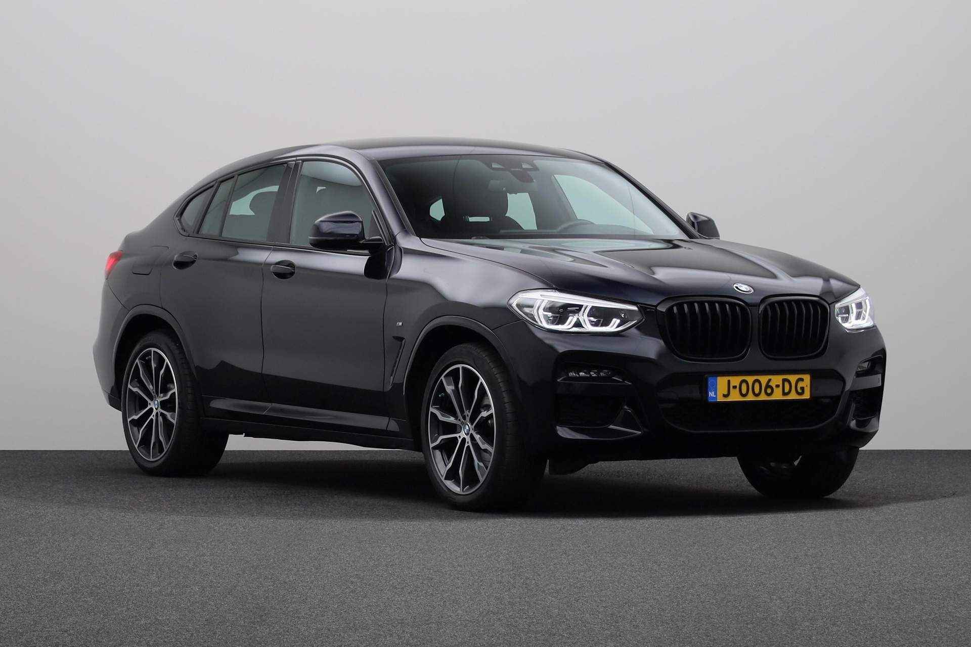 BMW X4 xDrive20i High Executive Edition | Model M Sport | Stuurwielrand verwarmd | High-beam assistant | BMW Head-Up Display | Harman Kardon Surround Sound Systeem | Comfort telefoonvoorbereiding met draadloze oplaadmogelijkheid | - 11/25