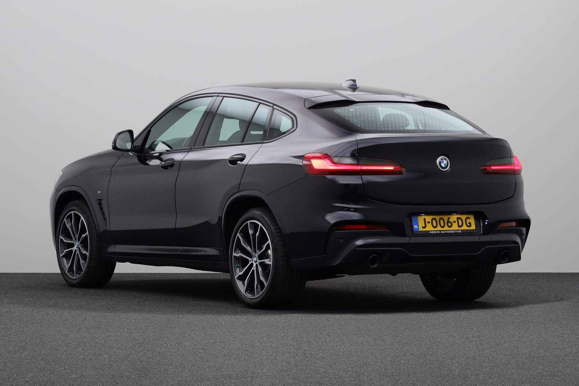 BMW X4 xDrive20i High Executive Edition | Model M Sport | Stuurwielrand verwarmd | High-beam assistant | BMW Head-Up Display | Harman Kardon Surround Sound Systeem | Comfort telefoonvoorbereiding met draadloze oplaadmogelijkheid | - 13/25