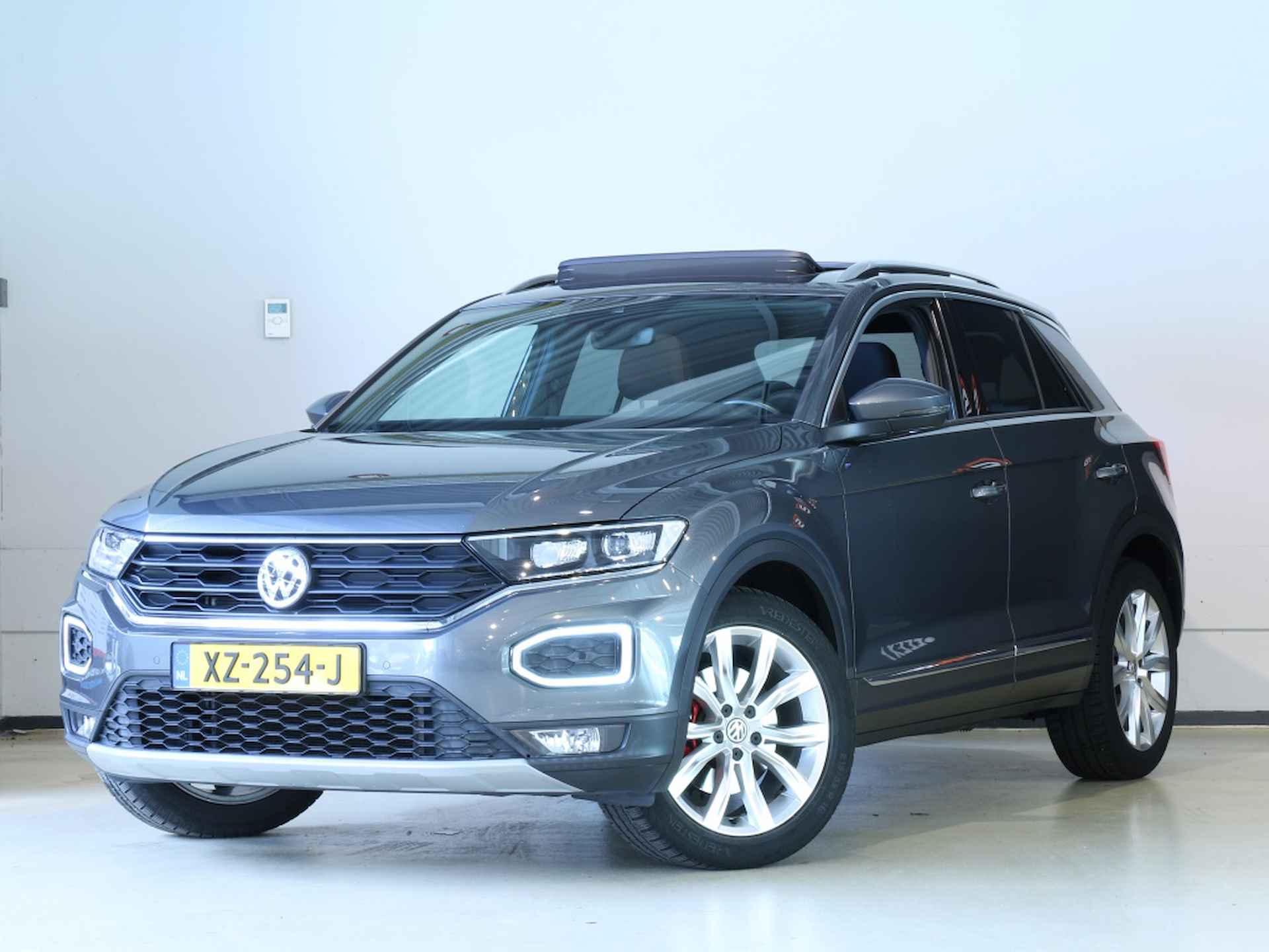 Volkswagen T-Roc 1.5 TSI Sport * RIJKLAARPRIJS * 12mnd BOVAG garantie - 18/25