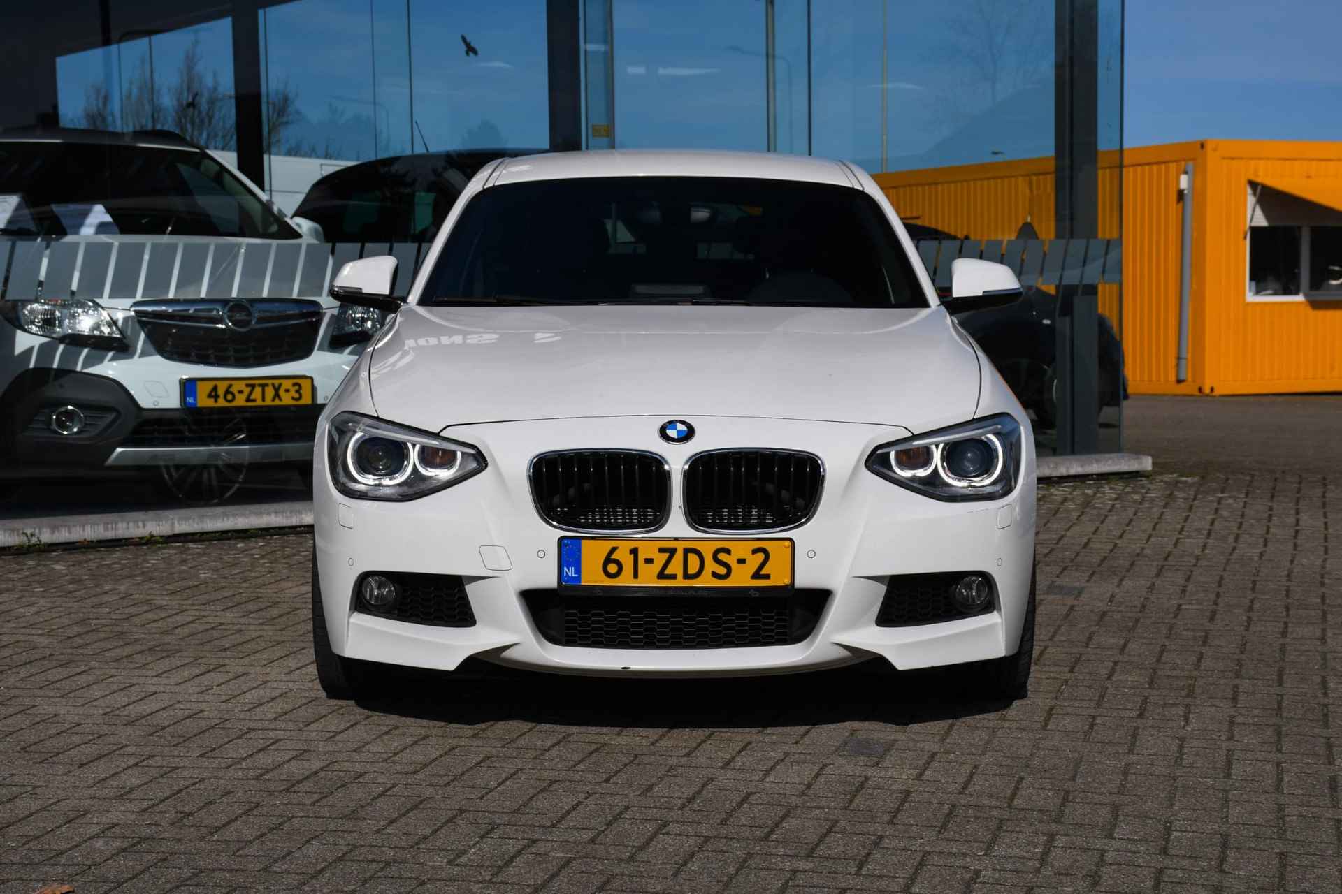 BMW 1-serie 114i Business+ NAVIGATIE/ LEDER/ LM 17/ PDC - 4/31