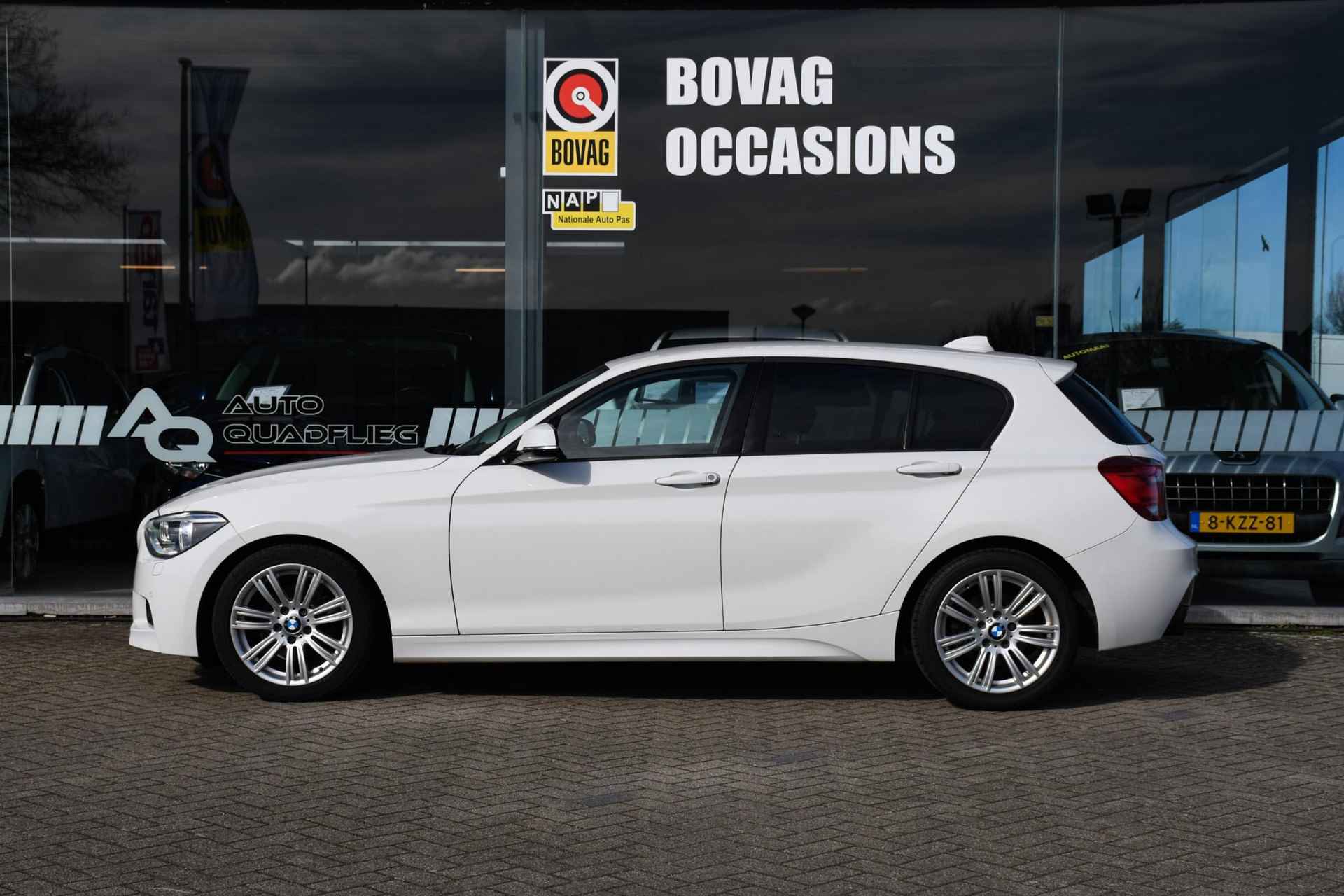 BMW 1-serie 114i Business+ NAVIGATIE/ LEDER/ LM 17/ PDC - 5/31