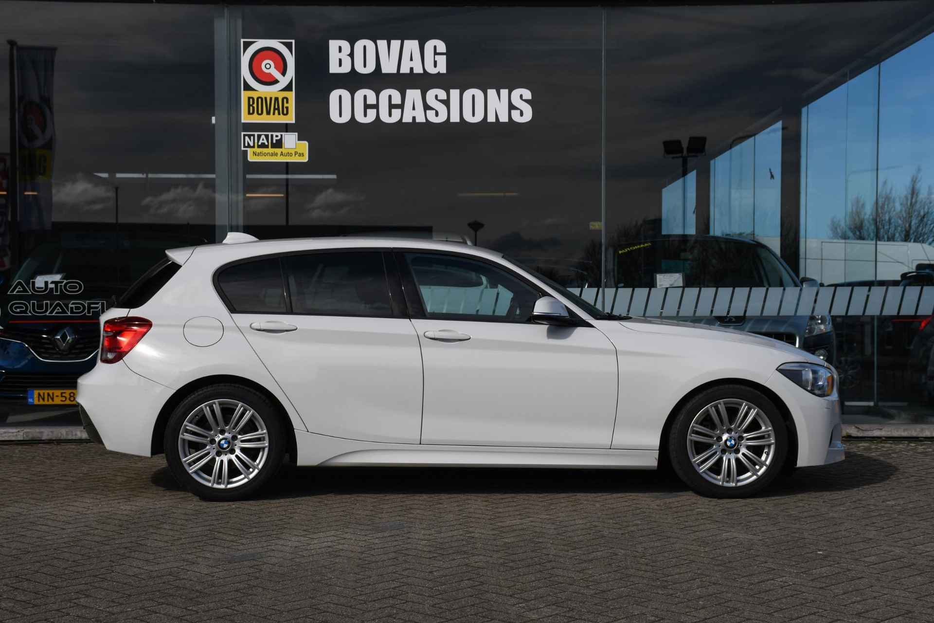 BMW 1-serie 114i Business+ NAVIGATIE/ LEDER/ LM 17/ PDC - 6/31