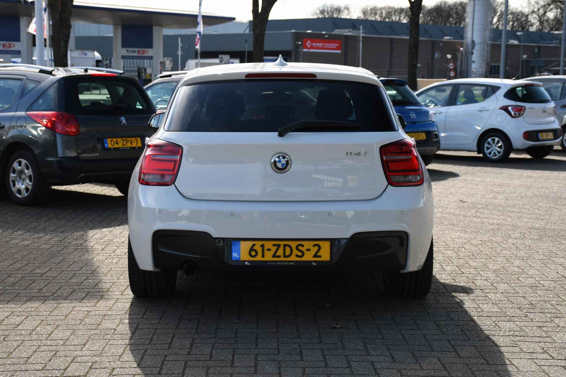 BMW 1-serie 114i Business+ NAVIGATIE/ LEDER/ LM 17/ PDC - 9/31