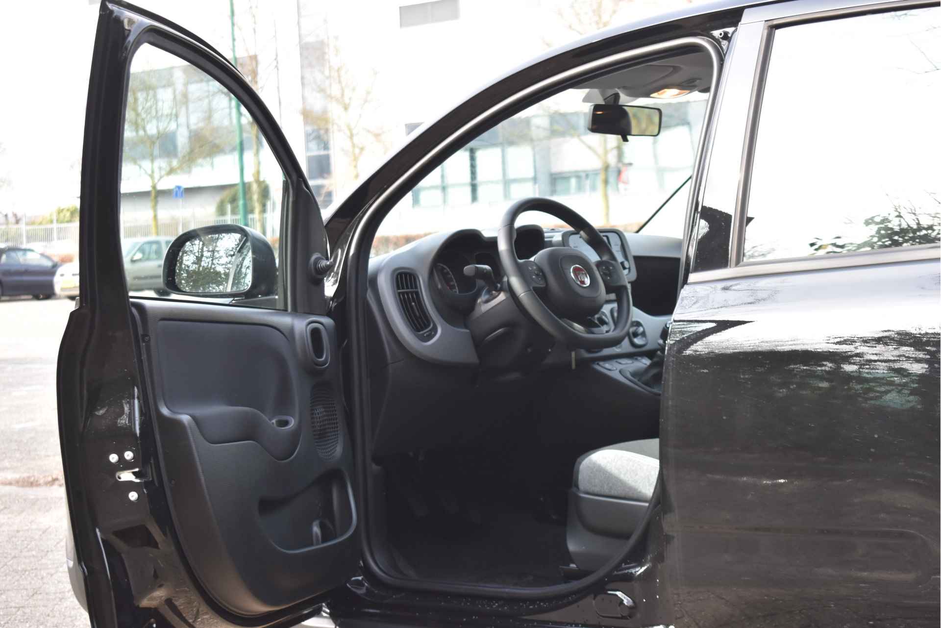 Fiat Panda 1.0 Hybrid | Airco | Bluetooth | DAB Radio | Elekt. ramen | LM-Velgen | Zeer netjes - 31/39