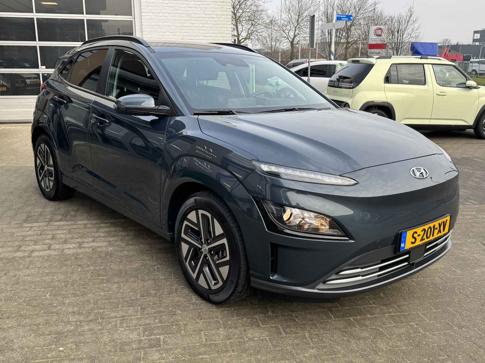 Hyundai Kona EV Fashion 64 kWh | 3 fase | Warmtepomp | Navigatie | Achteruitr - 6/28