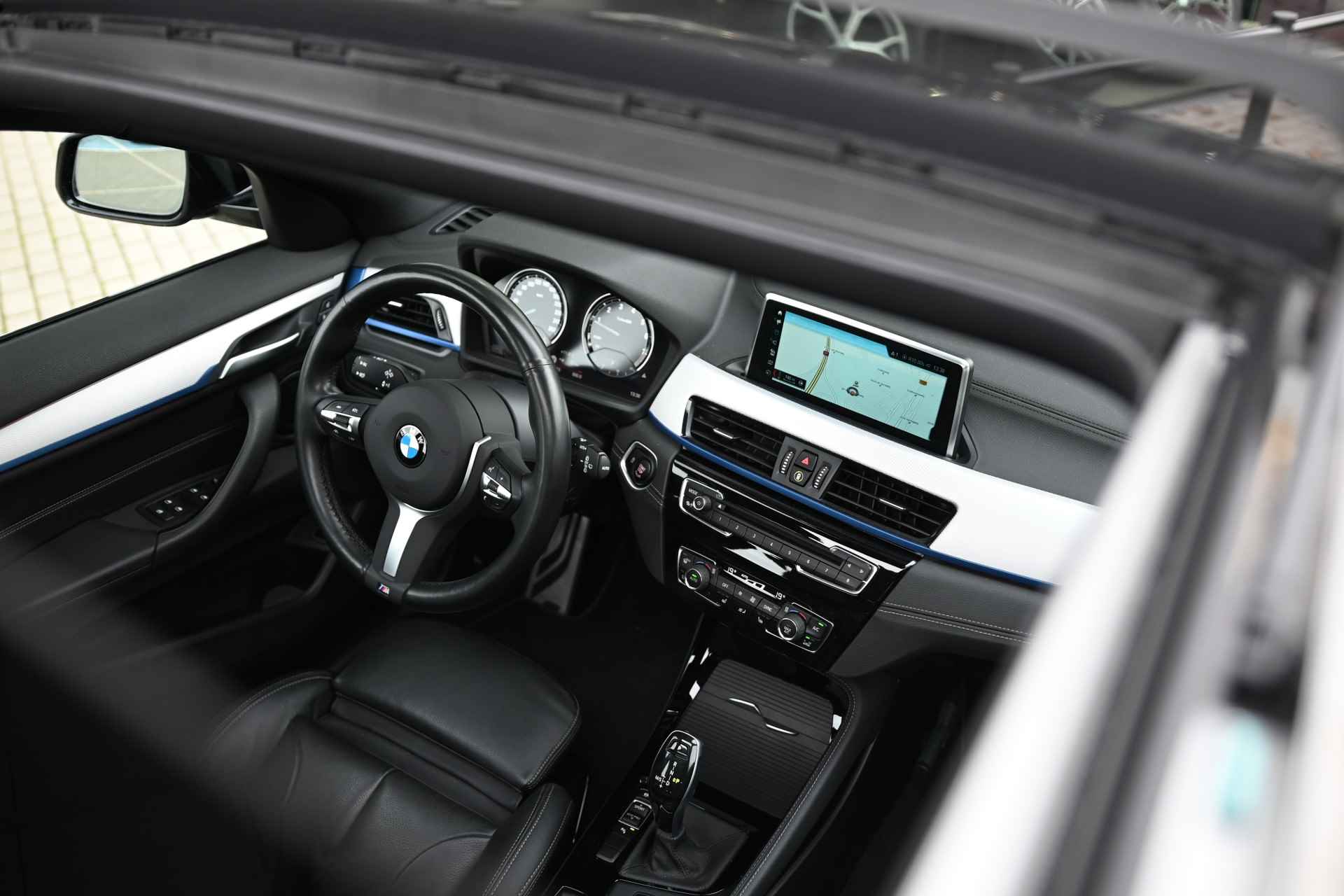 BMW X2 sDrive20i High Executive Automaat / Panoramadak / Achteruitrijcamera / Sportstoelen / Active Cruise Control  / LED / Head-Up / Park Assistant - 7/29