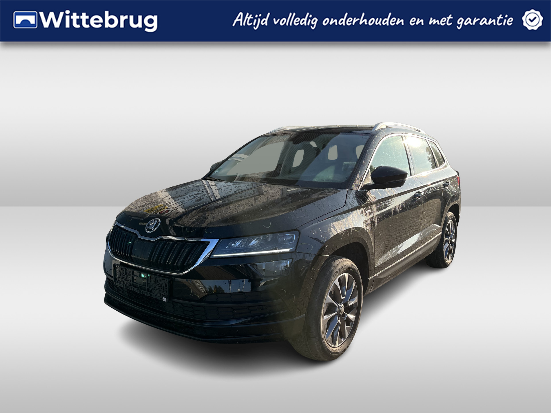 Škoda Karoq 1.0 TSI Ambition Drive 125 / PARK. SENSOREN/ LED/ CRUISE/ STOEL VERWARM./ KEYLESS/ APP CONNECT/ NAVI/ CLIMA/ DAB/ 17" LMV/