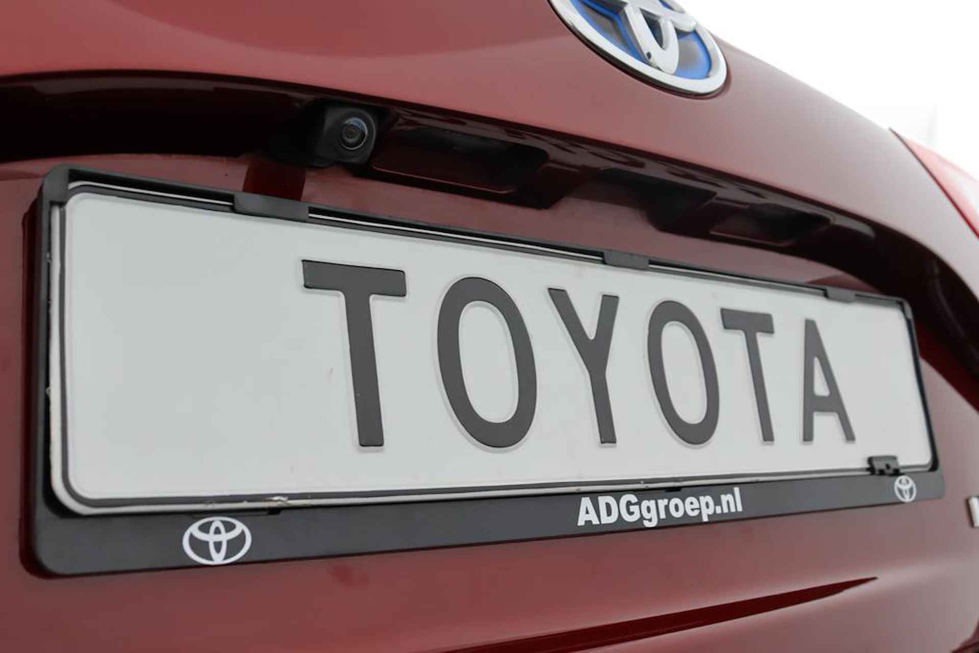 Toyota Yaris 1.5 Hybrid Design | Parkeersensoren Voor en Achter | Stoelverwarming | Cruise Control | Achteruitrijcamera | Led Verlichting | Parelmoer Rood | - 42/48