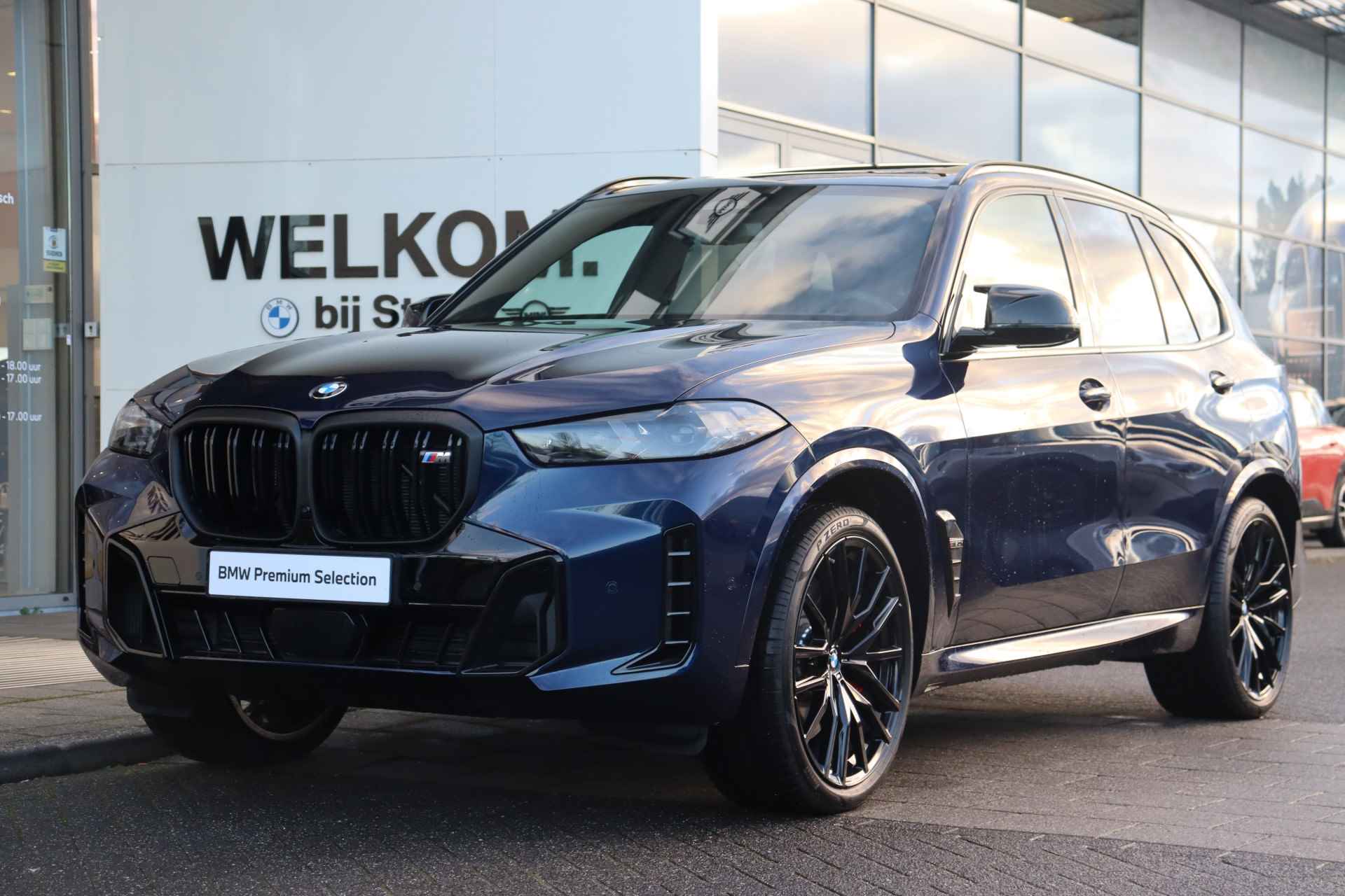 BMW X5 M60i xDrive High Executive Automaat / Panoramadak Sky Lounge / Massagefunctie / Adaptief M Onderstel Professional / Bowers & Wilkins / Parking Assistant Professional / Soft-Close - 9/60