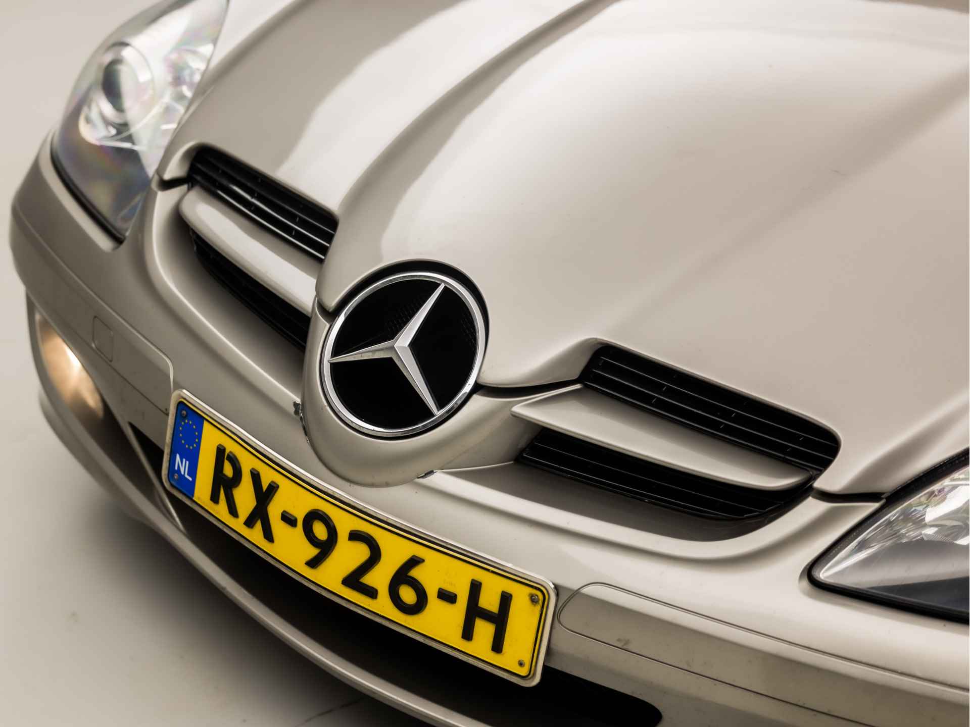 Mercedes-Benz SLK 200 K. Sport 164Pk Automaat (YOUNGTIMER, NAVIGATIE, STOELVERWARMING, LEDEREN SPORTSTOELEN, CRUISE, BLUETOOTH, XENON, PARKEERSENSOREN, NIEUWE APK, NIEUWSTAAT) - 25/29