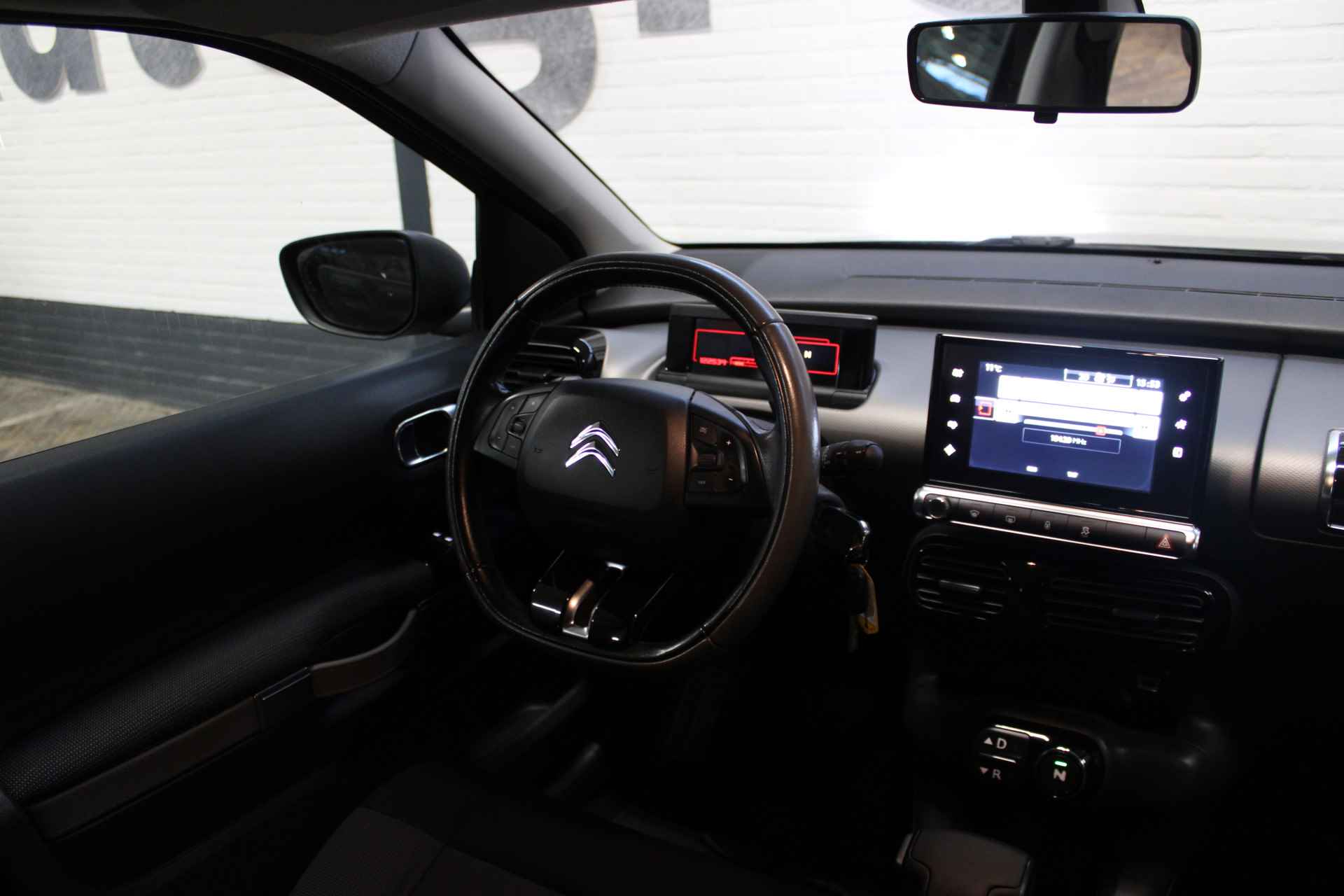 Citroën C4 Cactus 1.2 PureTech Feel | Incl. 12 maanden garantie | Climate control | Cruise control | Trekhaak | Bluetooth | Navigatie | Parkeercamera | - 39/46