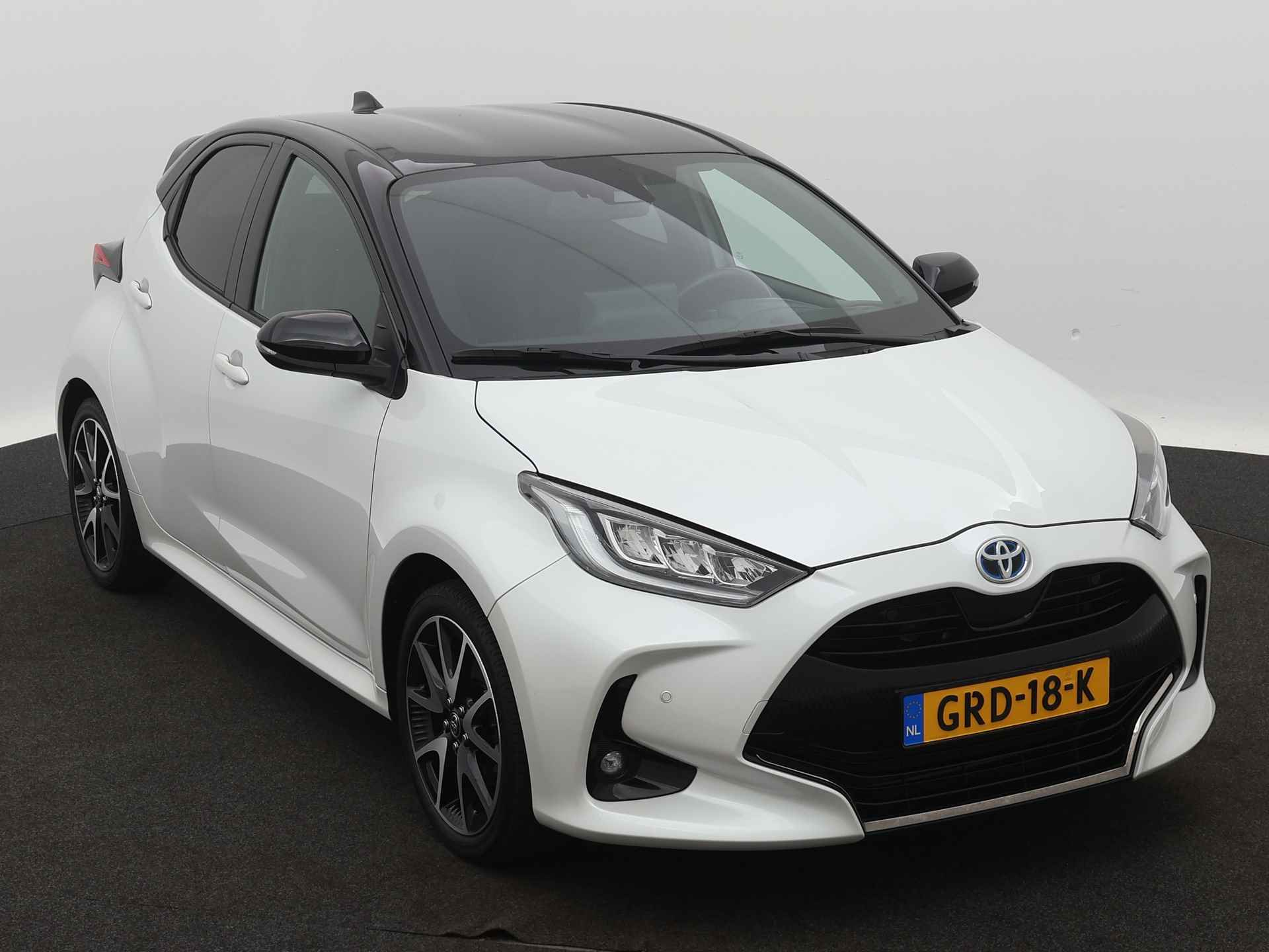 Toyota Yaris 1.5 Hybrid Executive - Bi tone Limited | Head up Display | Trekhaak | Half leder | LM velgen | Stoelverwarming | Parkeerhulp | LED | Apple Carplay/Android Auto | - 28/45