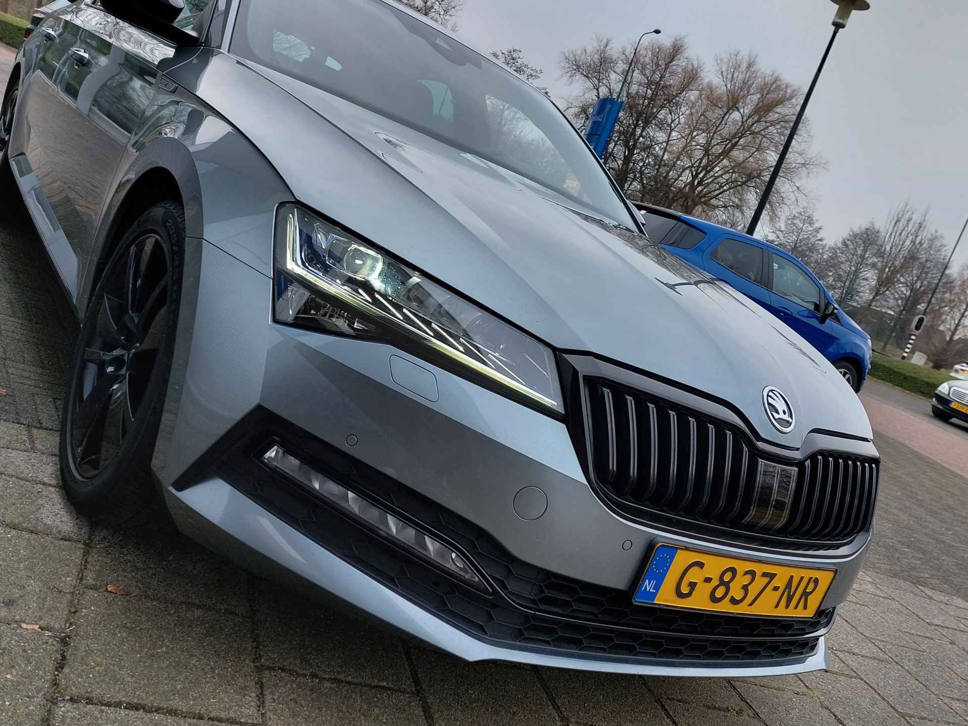 Škoda Superb 1.5 TSI ACT 150pk DSG Sportline Business | Navi + Apple Carplay+Android Auto | Clima | Cruise | Keyless Entry | Led Koplampen | Pdc V+A+Camera | Stoelverwarming | Privacy Glass | 18''lm - 49/54