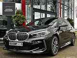 BMW 1-serie M135i xDrive High Executive | Stuurverw. | Stoelverw. | Adapt. Cruise | CarPlay | Keyless | DAB