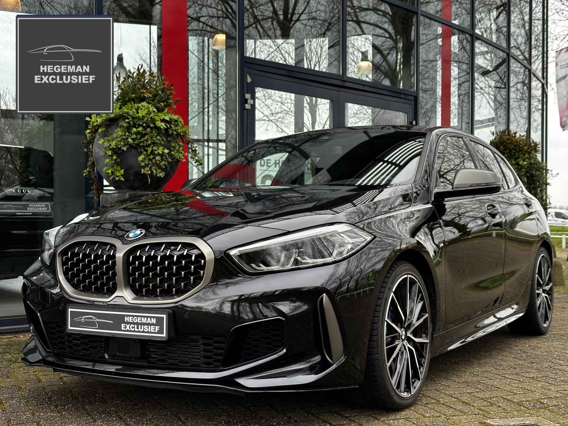 BMW 1-serie M135i xDrive High Executive | Stuurverw. | Stoelverw. | Adapt. Cruise | CarPlay | Keyless | DAB - 1/36