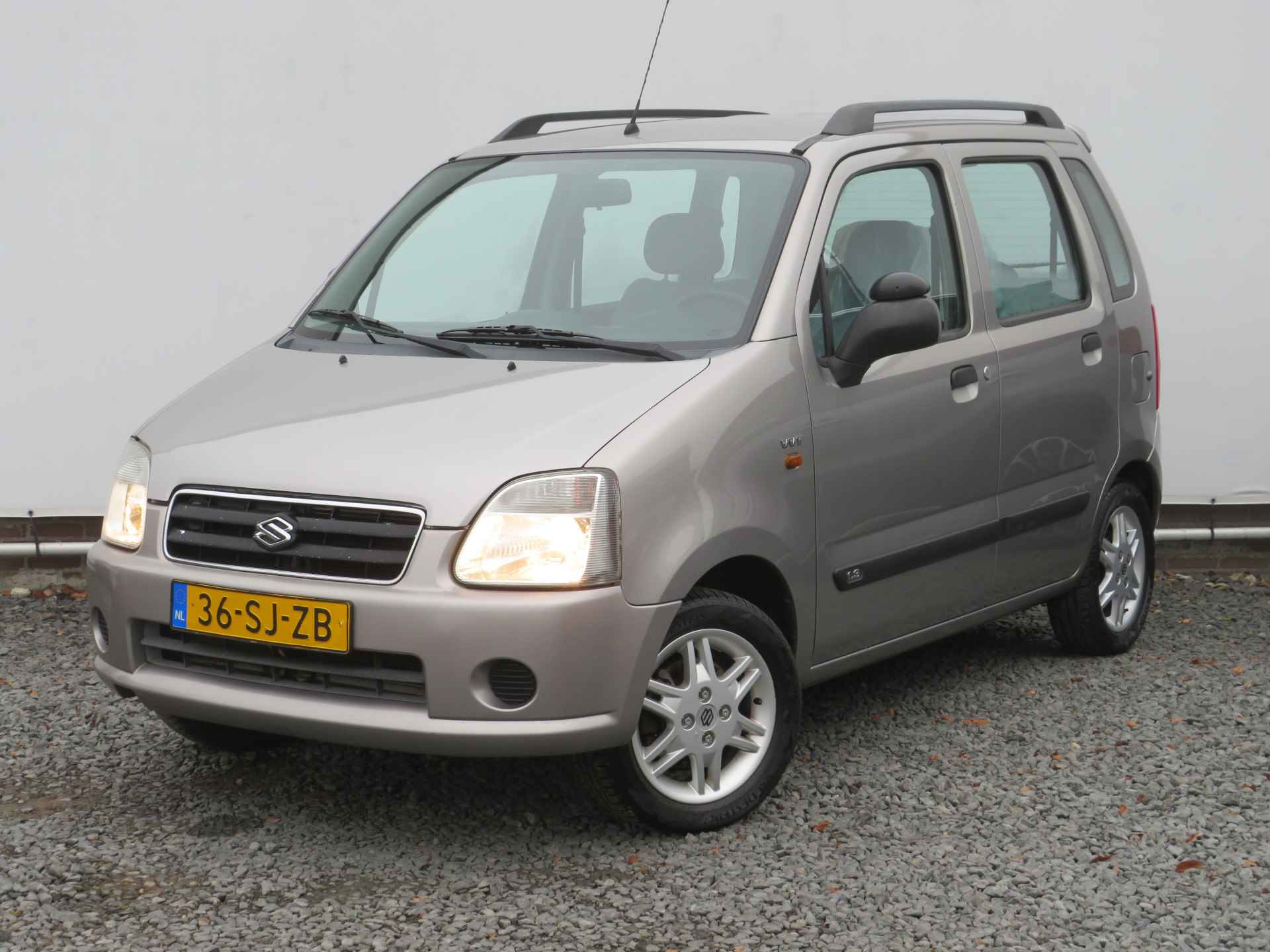 Suzuki Wagon R+ 1.3 FreeStyle, Automaat, Airco, Camera, Trekhaak en All-Seasonbanden - 4/27