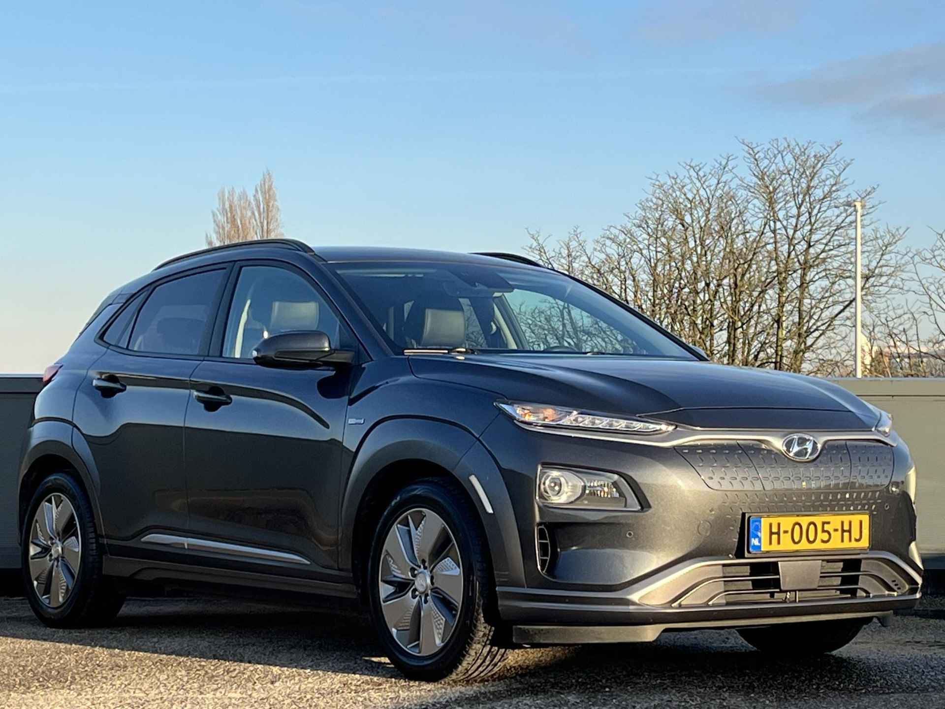 Hyundai Kona EV Premium 64 kWh | 3- Fase OBC | Geïntegreerde navigatiesysteem | Head up display | Lederen bekleding | - 8/57