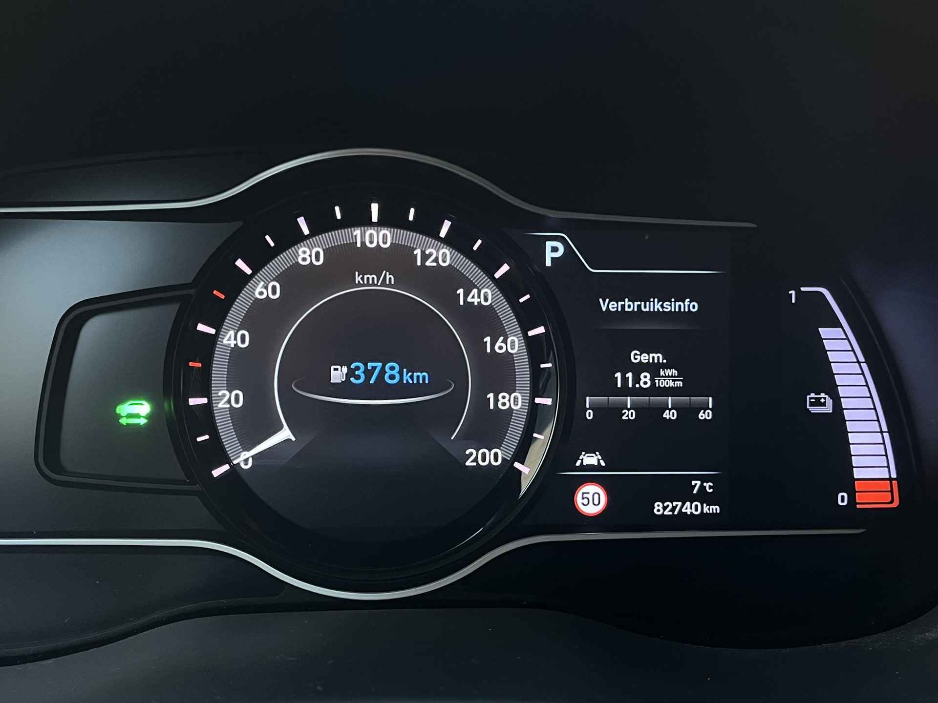 Hyundai Kona EV Premium 64 kWh | 3- Fase OBC | Geïntegreerde navigatiesysteem | Head up display | Lederen bekleding | - 33/57