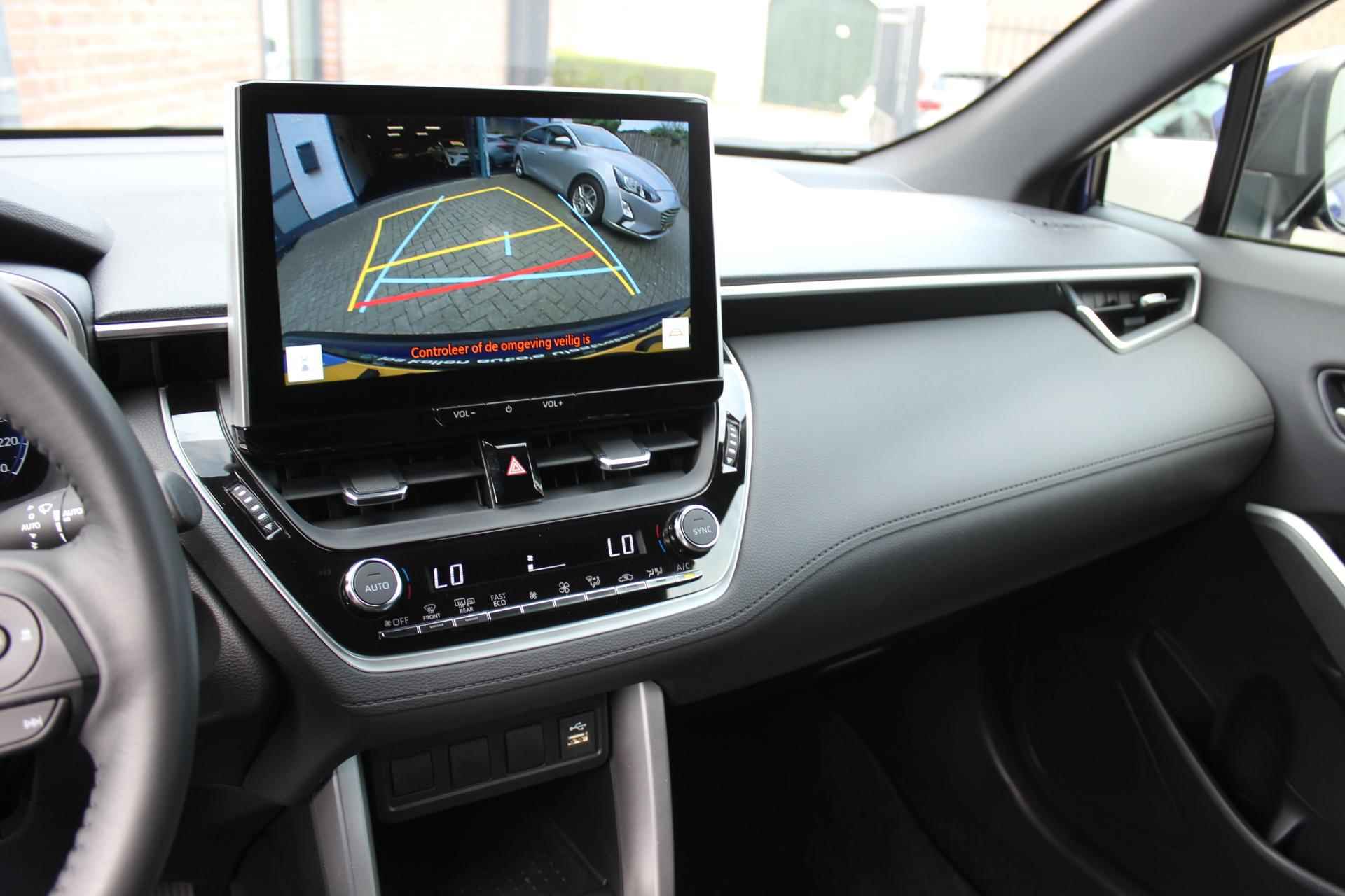 Toyota Corolla Cross 2.0 High Power Hybrid Active Navigatie, Carplay, Camera, PDC, Afn Trekhaak - 26/39